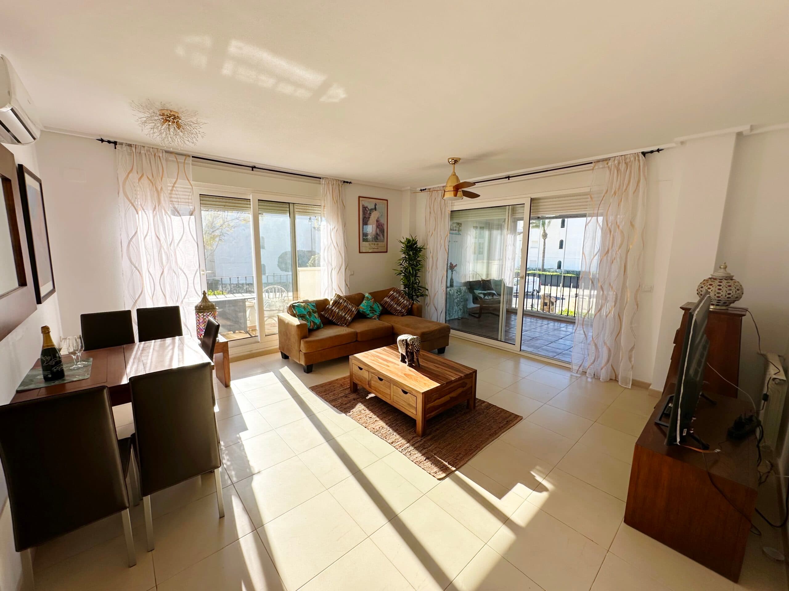 We are thrilled to offer this rarely available end first floor apartment with three terraces.  The property is south facing and has views over one of the resorts communal swimming pools.  It is being sold with aircon and gas central heating throughout.  The property has plenty of storage and being an end, has a window in the bathroom.  Its located a short walk to the town centre and supermarket.  It comes with allocated underground parking with lift access to the property.  Onsite you have a variety of bars and restaurants in the town centre, a supermarket, padel/tennis courts and a variety of outdoor mini gyms.  The town of Roldan is a 5 minutes drive and Murcia City 20 minutes drive.  The airport is a short 10 minutes drive.This is a large than average two bedroom apartment.  You enter into the sunny lounge diner where you have two terraces.  The main south facing terrace has glass curtains and a large storage cupboard, the second east facing terrace is perfect for that morning coffee.  There is a modern kitchen and separate utility room housing the boiler and washing machine.  In the hallway there is a double wardrobe / storage cupboard. A spacious family bathroom with window and two double bedrooms both with fitted wardrobes and access to another terrace which enjoys views over the gardens and one of the resorts communal pools.  This is a fantastic property, very well maintained and located.  Contact us to book a viewing appointment.