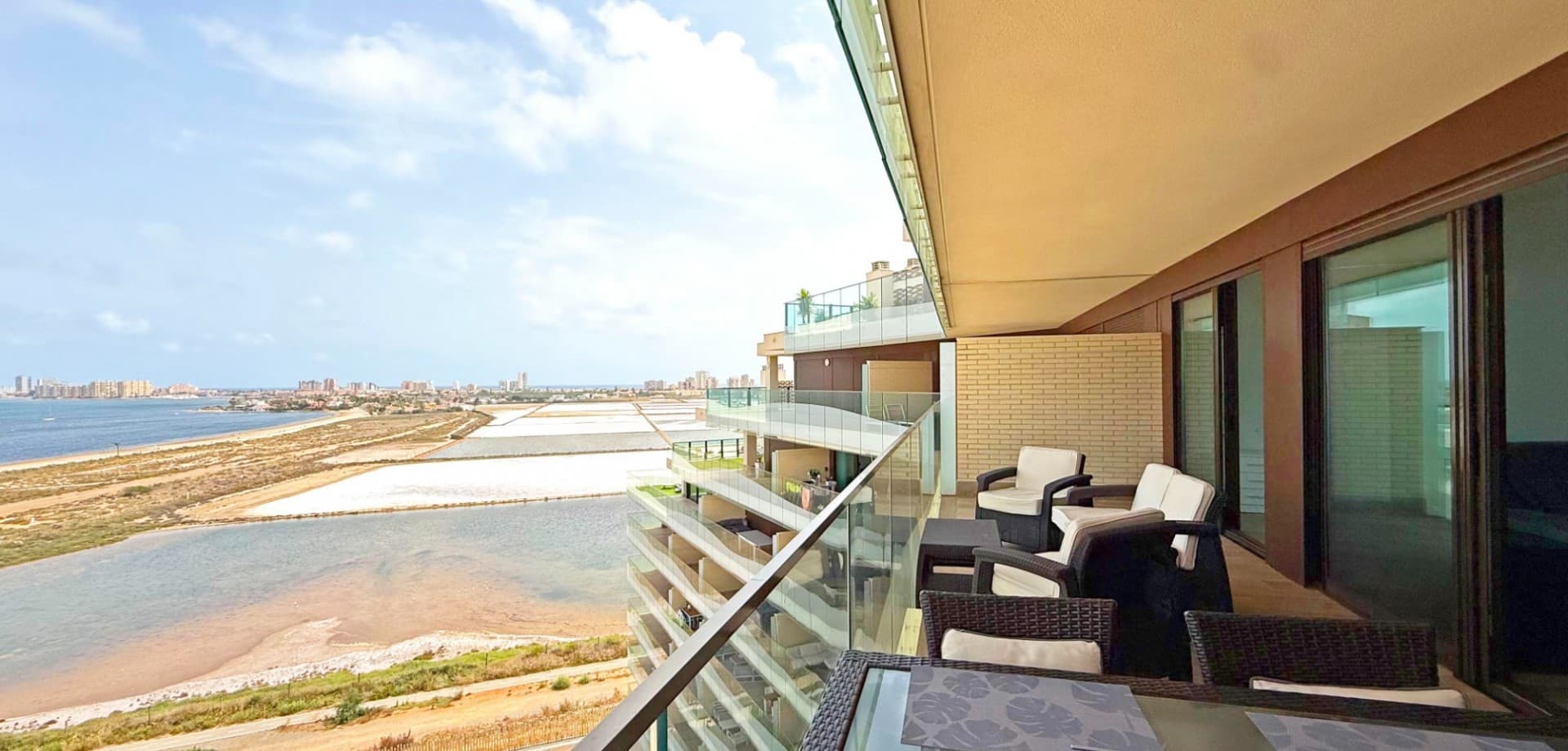 Experience luxury coastal living in this stunning 8th-floor apartment located in the prestigious Los Flamencos residential complex in Playa Paraíso, Cartagena. Situated on the first line to the beach, this modern, fully furnished home offers breathtaking panoramic views of both the Mar Menor and the Mediterranean Sea from its spacious balcony.

With 3 bedrooms and 2 bathrooms, the property is designed for comfort and convenience, featuring air conditioning, a bright open-plan living space, and elegant finishes throughout. The apartment includes a private underground parking space and storage room, ideal for year-round living or as a high-end holiday retreat.

Key Features:





3 spacious bedrooms





2 modern bathrooms





8th-floor with unbeatable sea views





Large private balcony





Fully furnished





Air conditioning throughout





Underground parking & storage





Exclusive Community Amenities:





Beachfront swimming pool area





Indoor spa with wellness facilities





Fully equipped gym





Landscaped gardens & picnic area





Remote work office & events hall (available to book)





Dog park & bird watching tower





Children's playground





Los Flamencos offers a unique blend of resort-style living and nature, just steps from the beach and close to all services in Playa Honda and La Manga. Whether you're looking for a permanent home, a vacation getaway, or a high-rental-potential investment—this property ticks all the boxes.

