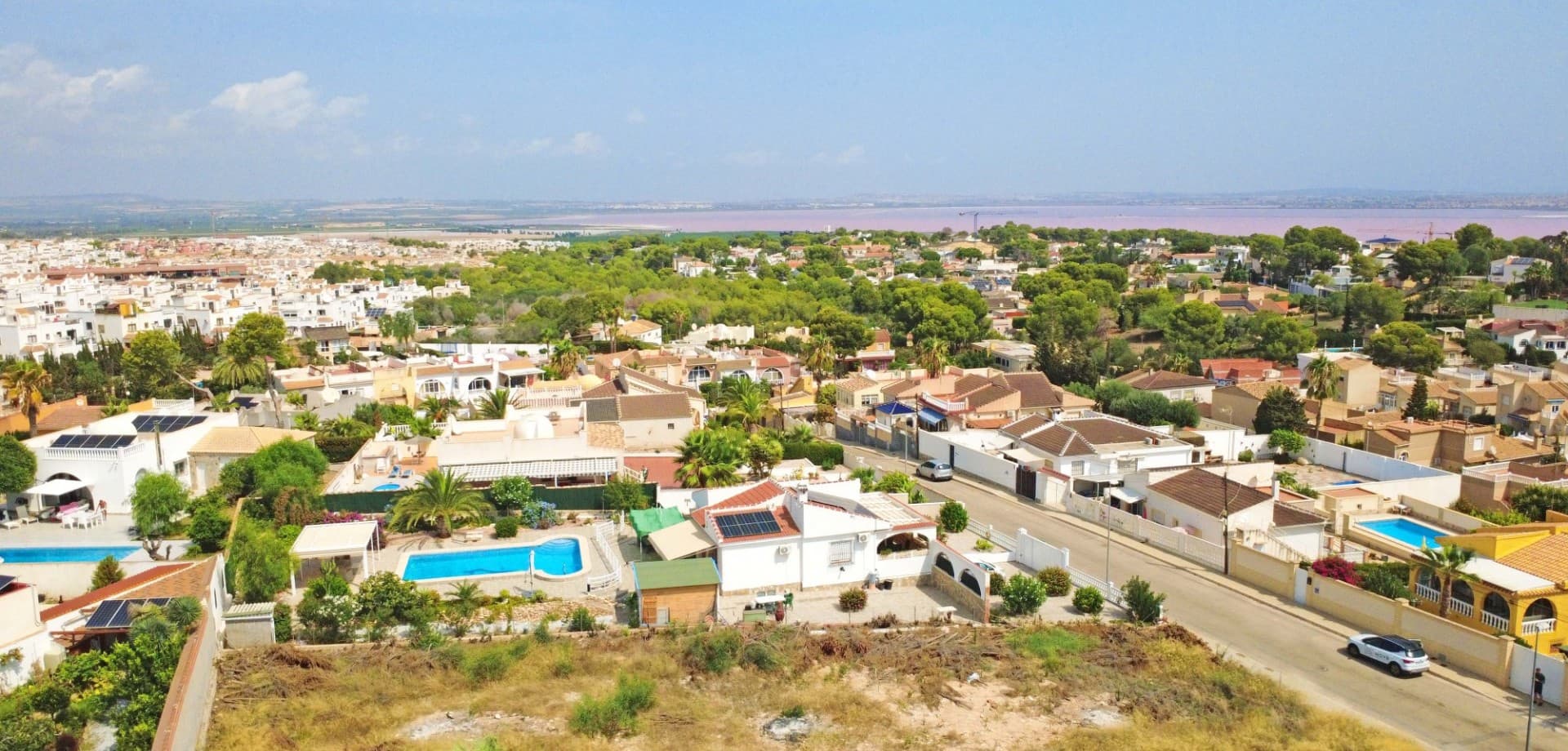 We are proud to present this exceptional 970 m² building plot, located in the highly sought-after residential area of Los Balcones, Torrevieja. Set within a quiet, established neighborhood, this plot offers the perfect balance of peace, privacy, and proximity to all essential services, including supermarkets, restaurants, schools, and medical facilities.

With building permits already in place, the plot allows for the construction of up to 503 m², including a spacious 140 m² basement and garage. This gives you the freedom to create a bespoke villa that perfectly suits your lifestyle, whether you’re envisioning a modern family home, a luxurious holiday retreat, or a high-value investment property.

One of the standout features is the potential for panoramic views of the famous pink salt lake, offering a truly unique and picturesque backdrop from your future home.

Key Features





Plot size: 970 m²





Buildable area: 503 m² (including basement & garage of 140 m²)





Permits included – ready to start building





Located in a quiet, established residential neighborhood





Close to all services: shops, restaurants, schools, hospital





Potential for lake views





This is a rare opportunity to secure a prime plot with excellent potential in one of the most desirable areas of Torrevieja.