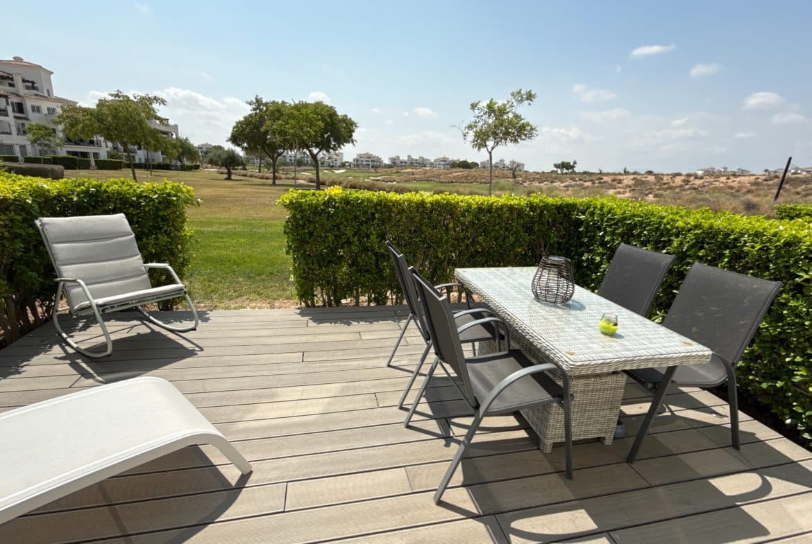 Discover this beautifully upgraded 2-bedroom apartment, ideally situated just a 2-minute walk from all the resort’s amenities at Hacienda Riquelme Golf Resort. Perfect for relaxing holidays, year-round living, or as a high-demand rental investment.Key Features:2 spacious bedrooms with modern furnishings and ample storage1 bathroom (with potential for easy modernisation to suit your taste)Upgraded kitchen featuring premium Bosch appliances – ideal for home cooking and entertainingBright open-plan living area with air conditioning throughout for year-round comfortLarge 20 m² terrace with glass curtains – enjoy outdoor living, dining, and entertaining in any seasonPrivate 20 m² garden with direct views over the landscaped gardens and golf courseSold fully furnished in a modern style – ready to move in or let immediatelyAmazing location: just 2 minutes’ walk to the resort’s bars, restaurants, and facilitiesGolf and garden views from both terrace and gardenAir conditioning in all rooms for maximum comfortWhy you’ll love it:This apartment stands out for its stylish upgrades, generous outdoor spaces, and unbeatable location within the resort. The terrace with glass curtains creates an extra living space all year round, while the upgraded kitchen and modern furnishings make it ready for immediate enjoyment. There’s also scope to easily modernise the bathroom to add value and personal touch.About Hacienda Riquelme Golf Resort:Enjoy access to a top-quality golf course, beautiful communal gardens, swimming pools, and excellent on-site dining – all in a secure and tranquil setting. Beaches, airports, and major towns are just a short drive away.Ready to view?Contact Us to arrange a viewing or request more details.