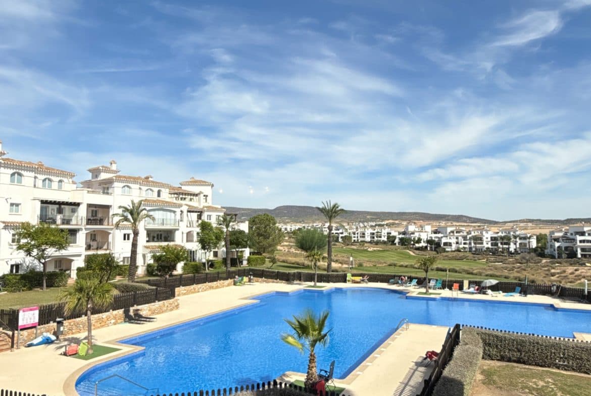 Discover this beautifully renovated 2-bedroom, 1-bathroom apartment located within the sought-after Hacienda Riquelme Golf Resort in Murcia, Spain. Ideally positioned just 3 km from the nearest town and only a 20-minute drive to the golden Murcia beaches, city centre and airport, this stylish property offers the perfect balance of relaxation, convenience, and investment potential.Recently upgraded to a high standard, the apartment boasts a large modern kitchen, a spacious lounge with bi-folding doors opening onto a generous terrace, and an upgraded bathroom with a walk-in shower. Enjoy year-round comfort with air conditioning throughout and two separate terrace areas, perfect for outdoor dining and entertaining.With beautiful swimming pool views and a contemporary design, this apartment is an excellent choice for families, holiday home buyers, or those seeking a rental investment on one of Murcia’s most popular golf resorts.Key Features:2 spacious bedrooms & 1 modern bathroomUpgraded large kitchen with contemporary fittingsDual terraces with pool viewsBi-folding doors from lounge to terraceAir conditioning throughoutRecently renovated to a high standardLocated on the prestigious Hacienda Riquelme Golf Resort20 minutes to Murcia beaches, city and airportThis stunning apartment combines modern living with Mediterranean charm in a secure, family-friendly golf resort community. Don’t miss the opportunity to own a home in one of Spain’s most desirable holiday and lifestyle destinations.