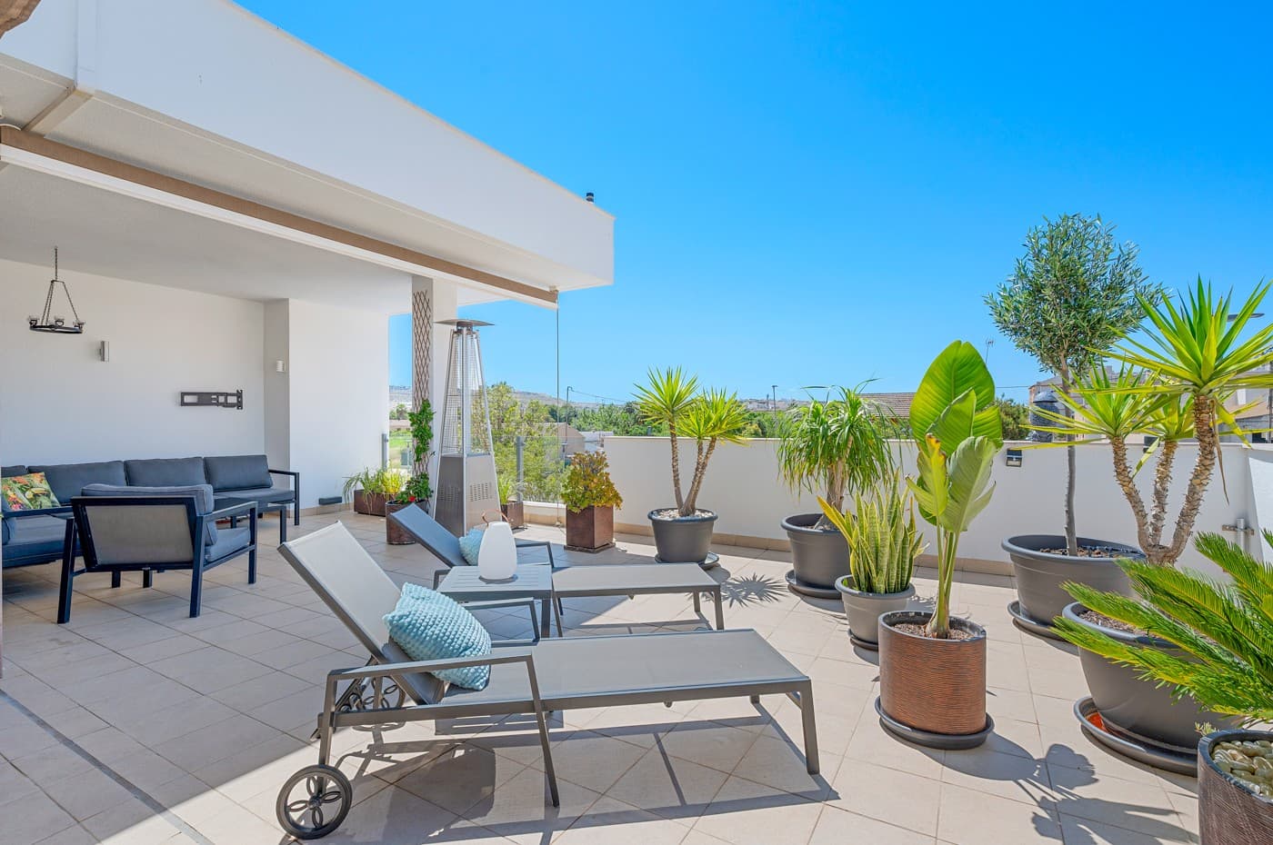 Located in the heart of the charming and authentic Spanish village of Formentera del Segura, this beautifully maintained townhouse offers a unique combination of modern comfort and traditional atmosphere. Built in 2018, the home is part of a small and exclusive community of only four properties. All current neighbours have owned their homes since the development was completed. This is the very first time one of these properties is being offered for sale, making it a rare and valuable opportunity.The property features three spacious bedrooms and two stylish bathrooms, one of which is en-suite. Two of the bedrooms are conveniently located on the ground floor, making the home practical and easy to live in year-round. The interior is tastefully decorated with high-quality furniture and finishes, all of which are included in the sale. The house has been meticulously cared for and is in excellent condition, offering a true turn-key solution.Outside, you are welcomed by a private swimming pool with a beautiful waterfall feature, as well as a private jacuzzi – the perfect spot for relaxation and enjoyment. The rooftop terrace offers wonderful potential: it has already been prepared for the extension of the third bedroom with one more private bathroom, with both drainage and electrical installations prepared. The terrace is ideal for entertaining or simply enjoying the Mediterranean lifestyle, complete with built-in sunshades, privacy screens, and a sheltered lounge area. The views from here are truly amazing!The home is equipped with a full-house water filtration system, allowing you to drink directly from the tap. There is air conditioning on both levels – a central system downstairs and a separate unit upstairs – as well as ventilation that has ensured no moisture issues, even when the house has been unoccupied for a long time. Fibre internet is installed and reinforced to provide strong coverage even on the rooftop terrace, making it suitable for working remotely or streaming under the sun also from the rooftop terrace!This lovely home is sold fully furnished. Formentera del Segura offers a welcoming, international community while maintaining its traditional Spanish soul. You’ll find local cafés, bakeries, and restaurants just a short walk away, nearest supermarket is just a two minutes walk! The Norwegian school is an 8-minute drive away. And the golden beaches of Guardamar del Segura only ten minutes by car. Several excellent golf courses are nearby, along with scenic cycling routes and natural parks. This is a truly special home in an exceptional location – perfect for those seeking comfort, style, and a peaceful way of life on the Costa Blanca.