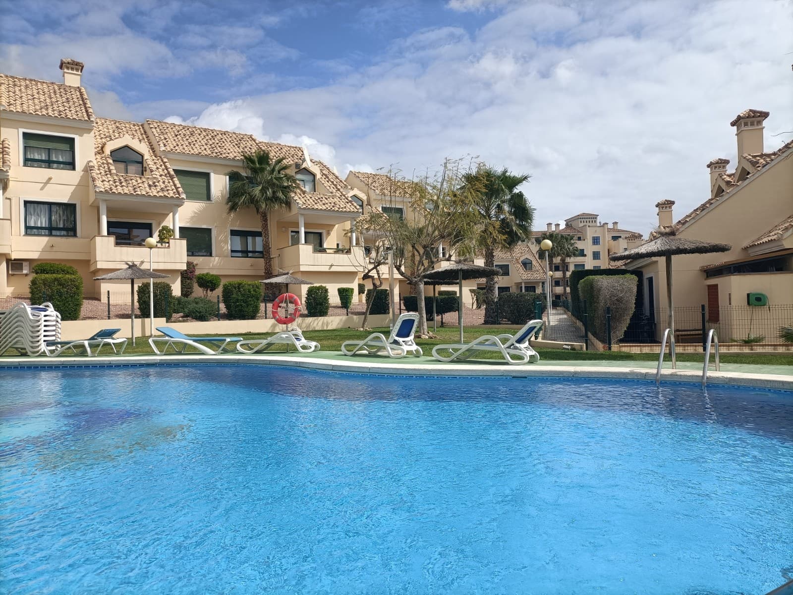 Located in the attractive golf area of Lomas de Campoamor, this fully renovated south-facing apartment offers the perfect blend of comfort and lifestyle. Positioned on an elevated ground floor, it enjoys open views, abundant natural light throughout the day, and a pleasant sense of privacy.The apartment has a built area of 83 m² and features two spacious bedrooms and two modern bathrooms, one of which includes an elegant walk-in shower. The renovation has been carried out with great attention to detail and high-quality materials, including large-format porcelain tiles and natural stone elements, creating a stylish and harmonious interior. The living area is bright and inviting, complemented by a fully equipped kitchen with induction hob and modern appliances.The apartment feels bright and airy thanks to beautiful natural light. Additional features include inverter air conditioning, central gas heating, dual water heaters, good sound insulation, integrated LED lighting, and a security system—ensuring comfort all year round.The property is sold fully furnished with stylish interiors, making it completely turnkey—simply unpack and start enjoying your new home.The community is well maintained, offering green areas and a communal swimming pool. Within walking distance, you will find Las Fuentes commercial center, a lively area with restaurants and cafés that quickly becomes a natural meeting point. For golf enthusiasts, Campoamor Golf Course is just nearby, along with several other well-known courses within easy reach.This is an excellent opportunity to acquire a high-quality, move-in-ready home in one of Costa Blanca’s most sought-after areas—perfect as a permanent residence, holiday home, or investment.