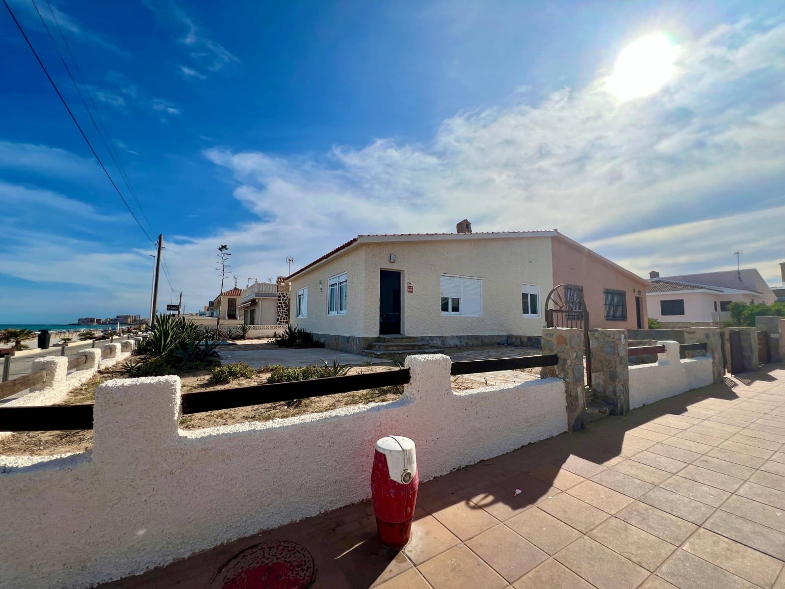 

Discover the perfect blend of comfort and location in this semi-detached villa, a true real estate gem with a privileged location on the front line of La Mata beach. This unique property, which has been meticulously renovated, represents an exceptional opportunity for those seeking a home ready to enjoy the sun and the sea breeze.

With the interior renovation already completed, this villa offers a modern and functional space. Every corner has been designed to maximize comfort and enjoyment. The high-quality finishes and an intelligent layout create an atmosphere of luxury and serenity, where only the final exterior touches are needed to turn it into the home of your dreams.

The true magic of this property lies in its impressive views. From the main room and the bedroom, you can wake up every morning to unparalleled panoramic views of the Mediterranean Sea. This direct connection with nature provides a sense of peace and exclusivity that is hard to find.

Its location not only offers the beach just a few steps away, but also places you at a convenient distance from a wide range of services, such as shops, restaurants, health centers, and leisure options, ensuring a comfortable and life full of possibilities.

This is the opportunity to live in an oasis of tranquility, with sea views, where every day will feel like a vacation. A ready-to-be-completed renovation project, this villa is more than just a property: it's the beginning of a dream lifestyle on the coast.







