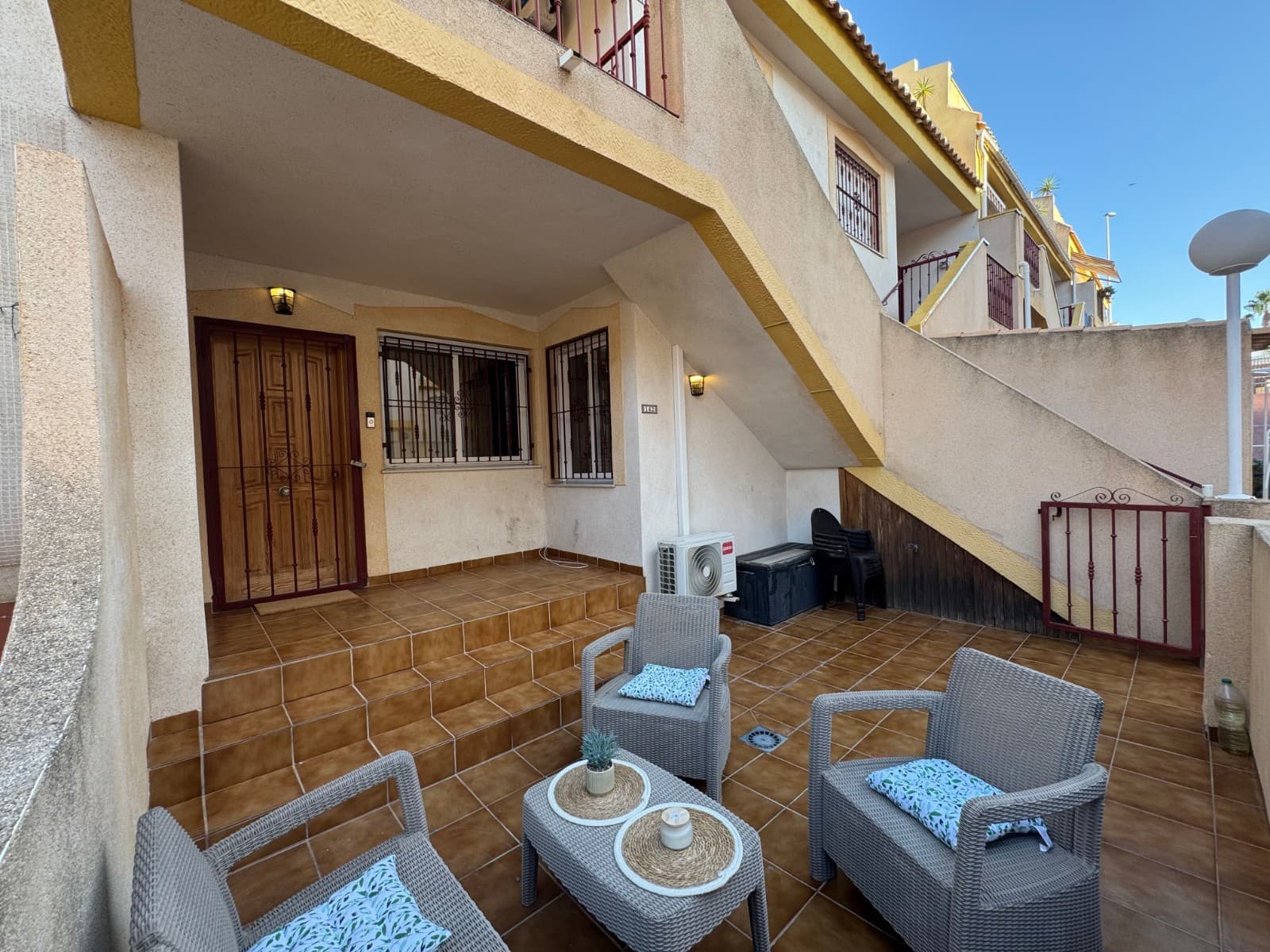 This stylish 2-bedroom, 2-bathroom ground floor apartment is located in the highly sought-after area of La Zenia. Fully renovated to a modern standard, it is ready to move straight into and enjoy.

On entering, you are welcomed by a spacious south-facing terrace – perfect for relaxing or entertaining.

The property boasts a bright open-plan living room and a contemporary fitted kitchen with breakfast bar. 

A private courtyard with storage adds extra practicality.

 There are two generous bedrooms – one with an en-suite washroom, plus a separate modern walk-in shower room.Set within a secure gated community, residents also enjoy access to a well-maintained communal pool area.

This apartment perfectly combines location, comfort, and convenience, making it an excellent opportunity to own a home in one of the most desirable areas of the Orihuela Costa