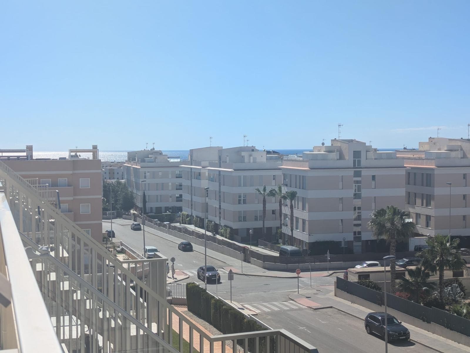 Discover stylish Mediterranean living with this exceptional penthouse apartment located in the highly sought-after Villamartin Gardens community in sunny Orihuela Costa. Combining modern comfort, spacious interiors, and superb amenities, this beautiful home is ideal as a permanent residence, holiday retreat, or excellent investment opportunity with fantastic holiday rental potential.The apartment offers three generously sized bedrooms and two contemporary bathrooms, including luxurious underfloor heating for year-round comfort. The master bedroom benefits from a private en-suite bathroom, while the elegant guest bathroom is conveniently positioned near the entrance hall.Designed with modern living in mind, the property features a bright and spacious open-plan living and dining area filled with natural light. The fully equipped contemporary kitchen seamlessly connects to the living space and includes a practical utility room with direct access to the terrace — perfect for outdoor dining, relaxing, and enjoying the wonderful Mediterranean climate.Villamartin Gardens is a beautifully maintained gated community offering outstanding facilities for residents of all ages. Enjoy two large outdoor swimming pools, a heated indoor pool for year-round use, an outdoor gym, petanque courts, and a children’s play area with swings, creating the perfect environment for both relaxation and recreation.The property also includes a secure underground parking space and a private locked storage room, ideal for bicycles, golf clubs, beach equipment, or additional storage needs.Perfectly positioned, the apartment is just minutes from everything you need. The popular Zenia Boulevard shopping centre — the largest in the area — is approximately one kilometre away, while supermarkets, cafés, restaurants, and local amenities are all within walking distance.