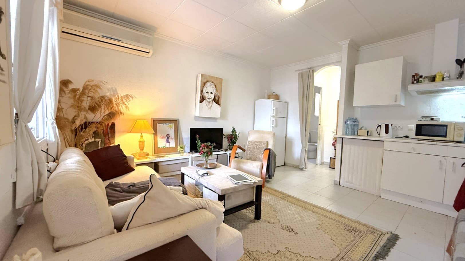 Discover Your Bungalow in TorreviejaWelcome to this charming property in San Luis, in the vibrant city of Torrevieja. This bungalow, with a construction area of 60 m², combines contemporary comfort with traditional style, offering a perfect retreat to enjoy the warm Spanish climate.Layout and AmenitiesThe home features a cozy bedroom and a bathroom, designed to provide a relaxing and functional environment. The layout is ideal for maximizing comfort, allowing all areas to be accessible and inviting. The bungalow comes fully furnished, ready for you to move in and start enjoying your new home.Outdoor Spaces that Invite RelaxationOne of the charms of this property is its terrace, perfect for enjoying the sun and the gentle breezes that caress the area. This outdoor space provides an ideal spot to relax, grow plants, or share pleasant moments with friends and family. The southwest orientation ensures abundant natural light throughout the day, creating a bright and welcoming atmosphere.Additional AmenitiesThe bungalow includes air conditioning for heating and cooling to ensure your comfort in any season. Additionally, it is located in an area with good connectivity, making it easy to access local services and tourist attractions. You will enjoy an environment that blends the tranquility of residential life with the proximity to urban amenities.Surroundings and LifestyleThe location in Torrevieja, one of the most beloved cities on the Costa Blanca, will give you the chance to explore beautiful beaches, enjoy delicious cuisine at local restaurants, and participate in vibrant festivals that reflect the local culture. The community surrounding this bungalow offers a friendly and welcoming atmosphere, perfect for those seeking a relaxed seaside lifestyle.This bungalow is more than just a property; it is an invitation to live a full and enriching lifestyle in one of the most sought-after coasts in Spain. Don’t miss the opportunity to make this place your new home at an incredible price!