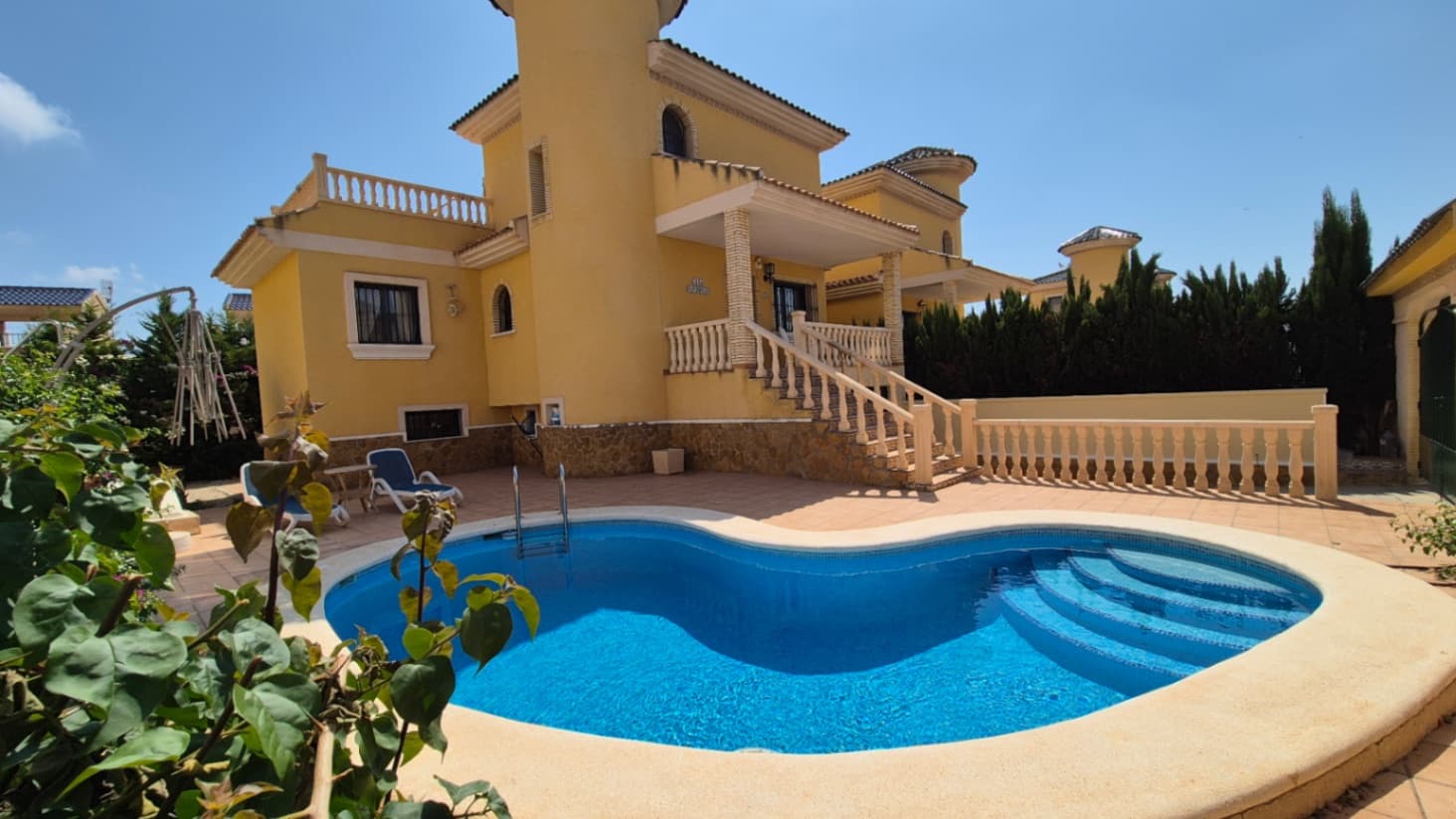This beautifully presented south-facing detached villa offers the perfect blend of comfort, space, and privacy. Set on a generous plot, the property features three spacious bedrooms and two modern bathrooms, making it ideal for families, holidaymakers, or those seeking a peaceful permanent residence.Enjoy the sunshine all day long from the private swimming pool, set within a beautifully landscaped garden that provides plenty of space for outdoor living, entertaining, and relaxation. In addition to the private pool, residents also benefit from access to a well-maintained communal pool, perfect for socializing or cooling off in a larger setting.The villa also boasts a large garage, offering ample storage space or parking for multiple vehicles, with additional potential for a workshop or hobby area.With its south-facing orientation, the property enjoys abundant natural light throughout the day and pleasant views across the surrounding area. This charming home combines privacy and practicality in a desirable location — ideal for enjoying the Mediterranean lifestyle to the fullest.