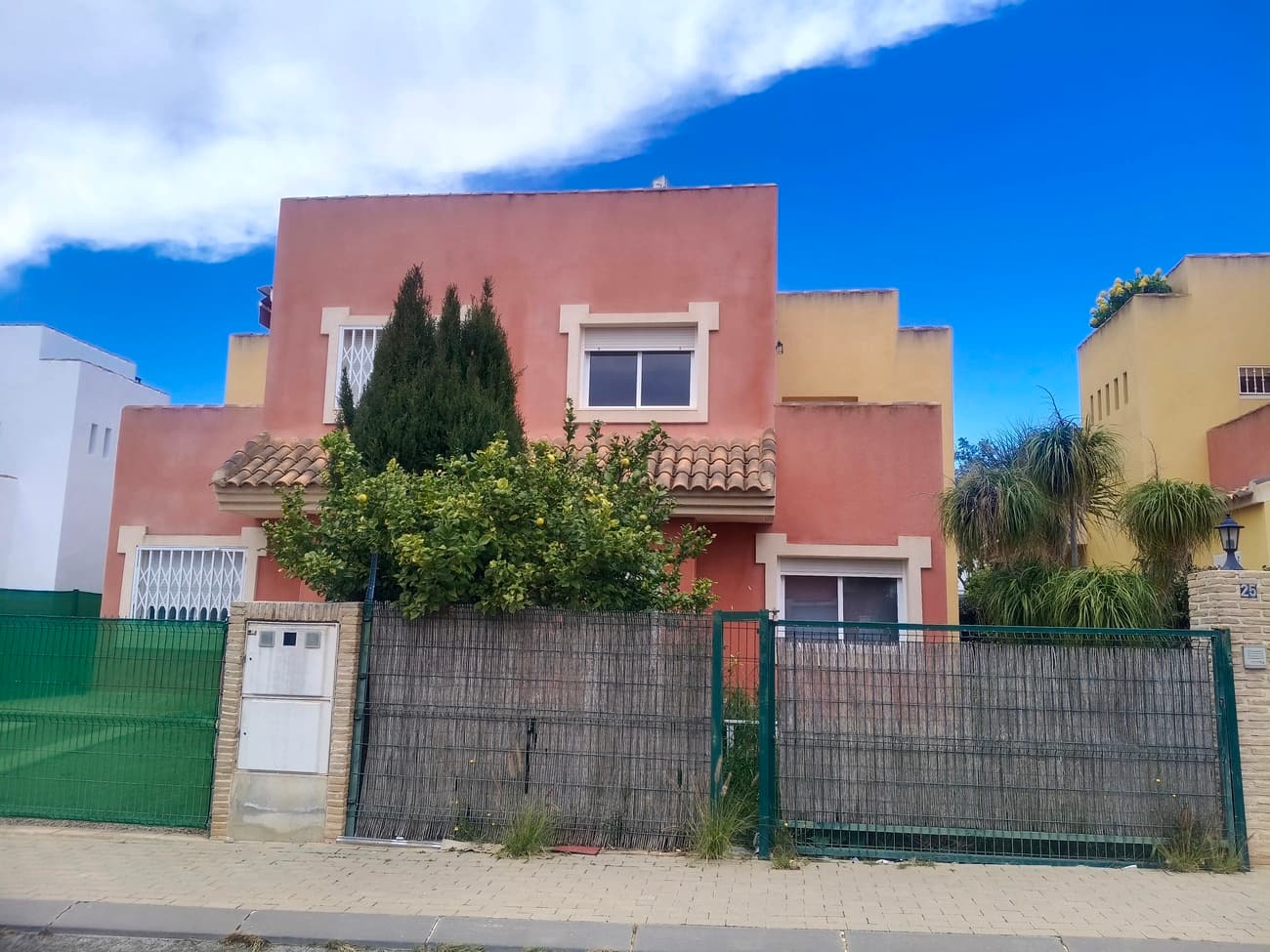 This beautiful villa offers spacious, light, bright, and airy living, with high-quality finishes and generous indoor and outdoor spaces.The property is entered via a front garden with driveway, leading to the front door which is set beneath a covered terrace. The villa also benefits from a large rear garden, ideal for outdoor living.The front door opens into a very bright and spacious open-plan living and dining area, featuring a fireplace with chimney and large patio doors that lead directly to the garden, allowing plenty of natural light throughout.The open-plan kitchen is spacious and well designed, featuring a fully fitted kitchen in neutral tones with quality grey granite worktops. Appliances include a fridge-freezer, oven, hob, and extractor fan, with space provided for both a washing machine and dishwasher. The kitchen also benefits from a breakfast bar open to the living area, a rear access door, and a separate utility area located just off the kitchen, ideal for housing the washing machine.Also on the ground floor is a spacious double bedroom, along with a family bathroom fitted with a bathtub, wash-hand basin, and WC.Upstairs, there are two further bedrooms. One is a double bedroom with fitted wardrobes and direct access to its own private terrace. The second bedroom also features fitted wardrobes and a double bed. This floor is completed by a second bathroom with a walk-in shower, wash-hand basin, and WC.From the upper terrace, an external staircase leads to the private roof terrace, where you can enjoy fantastic panoramic views of the surrounding mountains, the Spanish countryside, and the traditional village of La Tercia.The villa has access to a community swimming pool and also offers sufficient space to install a private pool, should the new owners wish.Ideally located close to a wide range of amenities including restaurants, bars, shops, a medical centre, entertainment facilities, and several children’s parks and family areas, the property is just 20 minutes from the coast and approximately 15 minutes from the airport, offering excellent accessibility.The villa is sold part-furnished and is highly recommended for viewing