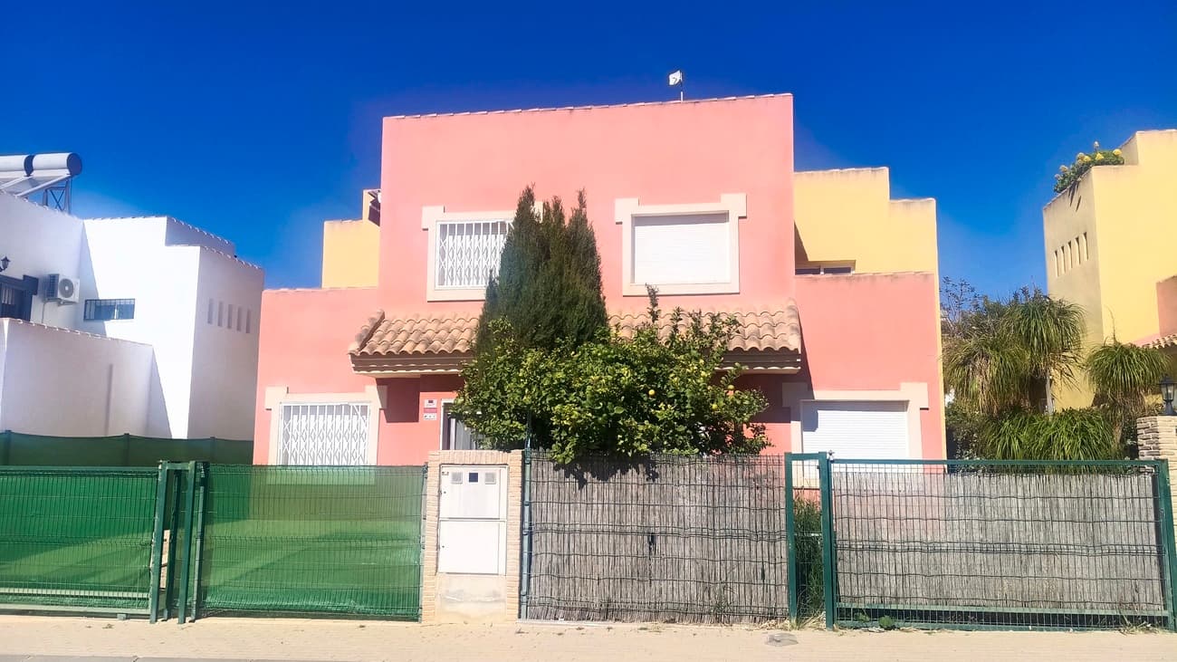 This beautiful villa offers spacious, light, bright, and airy living, with high-quality finishes and generous indoor and outdoor spaces.The property is entered via a front garden with driveway, leading to the front door which is set beneath a covered terrace. The villa also benefits from a large rear garden, ideal for outdoor living.The front door opens into a very bright and spacious open-plan living and dining area, featuring a fireplace with chimney and large patio doors that lead directly to the garden, allowing plenty of natural light throughout.The open-plan kitchen is spacious and well designed, featuring a fully fitted kitchen in neutral tones with quality grey granite worktops. Appliances include a fridge-freezer, oven, hob, and extractor fan, with space provided for both a washing machine and dishwasher. The kitchen also benefits from a breakfast bar open to the living area, a rear access door, and a separate utility area located just off the kitchen, ideal for housing the washing machine.Also on the ground floor is a spacious double bedroom, along with a family bathroom fitted with a bathtub, wash-hand basin, and WC.Upstairs, there are two further bedrooms. One is a double bedroom with fitted wardrobes and direct access to its own private terrace. The second bedroom also features fitted wardrobes and a double bed. This floor is completed by a second bathroom with a walk-in shower, wash-hand basin, and WC.From the upper terrace, an external staircase leads to the private roof terrace, where you can enjoy fantastic panoramic views of the surrounding mountains, the Spanish countryside, and the traditional village of La Tercia.The villa has access to a community swimming pool and also offers sufficient space to install a private pool, should the new owners wish.Ideally located close to a wide range of amenities including restaurants, bars, shops, a medical centre, entertainment facilities, and several children’s parks and family areas, the property is just 20 minutes from the coast and approximately 15 minutes from the airport, offering excellent accessibility.The villa is sold part-furnished and is highly recommended for viewing