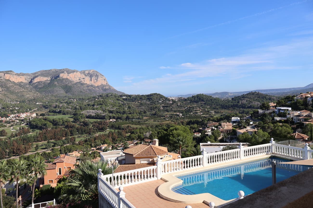 180 degrees panoramic sea and golf and mountain view villa. Built by the current owner from new is seeking a new owner. The villa offers ample space. On the main area you have a large kitchen lounge area, adjacent to a covered internal courtyard, leading on to a serene pool relaxation area with a summer kitchen and shower. The other areas on the ground floor are 2 large bedrooms with ensuite bathrooms.The upper levels offers a master bedroom with a bathroom, fitted wardrobes. Hot and cold air conditioning vented throughout.  The terrace from the master room offers amazing views. This villa is well priced and has a very good potential if you wish to have a project. The downstairs where the garage exists can be easily made into a 2 bedroom seperate apartment and has it is own existing bathroom, toilet area.The pool area has sun all day.