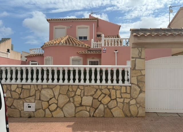 This stunning newly renovated detached villa offers the perfect blend of space, comfort, and flexibility in a highly desirable location. Just a 10-minute walk from the popular Emerald Isle with its public swimming pool and entertainment, the property is also within a short walking distance of the Abbey Tavern and Mumbai Blue, offering great dining and social options close by. Additionally, the famous Zenia Boulevard shopping center and the beautiful beaches of La Florida (Playa Flamenca, Punta Prima, La Zenia & Cabo Roig) are both less than a 10-minute drive away, making this an ideal spot for those seeking convenience and coastal living.With five bedrooms and two bathrooms, this home is perfect for large families or those seeking multi-purpose living. The property features separate housing on each floor, with three bedrooms and one bathroom upstairs, while the downstairs offers a self-contained two-bedroom, one-bathroom space with an open-plan kitchen and private entrance—ideal for extended family, guests, or rental opportunities.A glazed breakfast terrace provides a bright and relaxing space to start your day, while the tiled patio garden offers ample room for outdoor enjoyment, with the potential to add a private pool. The villa also includes a spacious roof solarium, perfect for soaking up the sun or enjoying the views. Additional features include air conditioning, gas central heating, and off-road parking. The garage has been transformed into a home gym but can easily be repurposed if needed.A standout feature of this property is the separate outhouse, which can serve as a guestroom, home office, or workshop, providing extra versatility to suit your lifestyle. The property also includes a garden shed for additional storage. With its prime location, adaptable living spaces, and excellent outdoor areas, this villa is a rare opportunity that offers both comfort and potential. We offer a convenient buy online service, allowing you to purchase any property with us from anywhere in the world. Our secure and streamlined process ensures a hassle-free experience, with expert guidance at every stage. Whether you're buying for investment, relocation, or a holiday home, you can complete your purchase remotely with confidence. Contact us today to learn more about how we can help you find and secure your ideal property online.