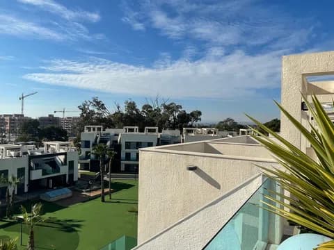Exclusive Penthouse with Private Rooftop Terrace – Built in 2019Are you dreaming of a modern holiday home in Spain where luxury, comfort, and tranquility meet? This elegant penthouse apartment has it all – a spacious private rooftop terrace, stylish interiors, fantastic communal facilities, and a unique location close to the famous La Mata salt lake.Property HighlightsPrivate 67 m2 rooftop terrace with open views towards El Raso and the mountains2 bright bedrooms with built-in wardrobes – master with en-suite bathroom2 modern bathrooms with sleek finishesSpacious open-plan kitchen and living area with high ceilings and natural lightSouth-facing terrace overlooking the palm garden, pool, and Torrevieja’s evening skylineAir conditioning in both the living room and bedroomsPrivate underground parking with space for a car and bicyclesPremium Community FacilitiesThe gated complex offers everything you need to enjoy life under the Spanish sun:Two large pool areas surrounded by lush gardens and palm treesFitness area, mini golf, pétanque court, and children’s playgroundExclusive spa with jacuzzi and sauna (including infrared option)Perfect LocationThe apartment is set in a peaceful area with restaurants, bars, and a minimarket within walking distance. Every Sunday you can also explore a large local “lemon market” nearby.Only 4.5 km from some of the best beaches on the coastClose to the La Mata salt lake, renowned by WHO for its healthy microclimate – great for asthma, allergies, and joint issuesScenic surroundings with palm trees, mountain views, and sunshine year-roundAn Ideal Investment – and a Retreat in the SunWhether you’re looking for your private holiday getaway or a lucrative rental opportunity, this penthouse is a rare combination of modern comfort, stunning surroundings, and a prime location.Contact us today for more information or to arrange a viewing – this property is a must-see!
