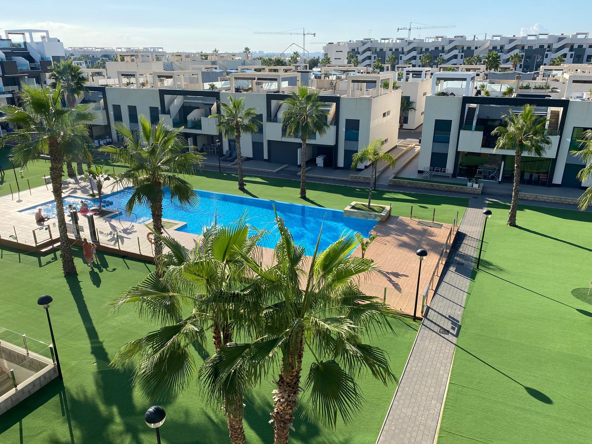 Exclusive Penthouse with Private Rooftop Terrace – Built in 2019Are you dreaming of a modern holiday home in Spain where luxury, comfort, and tranquility meet? This elegant penthouse apartment has it all – a spacious private rooftop terrace, stylish interiors, fantastic communal facilities, and a unique location close to the famous La Mata salt lake.Property HighlightsPrivate 67 m2 rooftop terrace with open views towards El Raso and the mountains2 bright bedrooms with built-in wardrobes – master with en-suite bathroom2 modern bathrooms with sleek finishesSpacious open-plan kitchen and living area with high ceilings and natural lightSouth-facing terrace overlooking the palm garden, pool, and Torrevieja’s evening skylineAir conditioning in both the living room and bedroomsPrivate underground parking with space for a car and bicyclesPremium Community FacilitiesThe gated complex offers everything you need to enjoy life under the Spanish sun:Two large pool areas surrounded by lush gardens and palm treesFitness area, mini golf, pétanque court, and children’s playgroundExclusive spa with jacuzzi and sauna (including infrared option)Perfect LocationThe apartment is set in a peaceful area with restaurants, bars, and a minimarket within walking distance. Every Sunday you can also explore a large local “lemon market” nearby.Only 4.5 km from some of the best beaches on the coastClose to the La Mata salt lake, renowned by WHO for its healthy microclimate – great for asthma, allergies, and joint issuesScenic surroundings with palm trees, mountain views, and sunshine year-roundAn Ideal Investment – and a Retreat in the SunWhether you’re looking for your private holiday getaway or a lucrative rental opportunity, this penthouse is a rare combination of modern comfort, stunning surroundings, and a prime location.Contact us today for more information or to arrange a viewing – this property is a must-see!