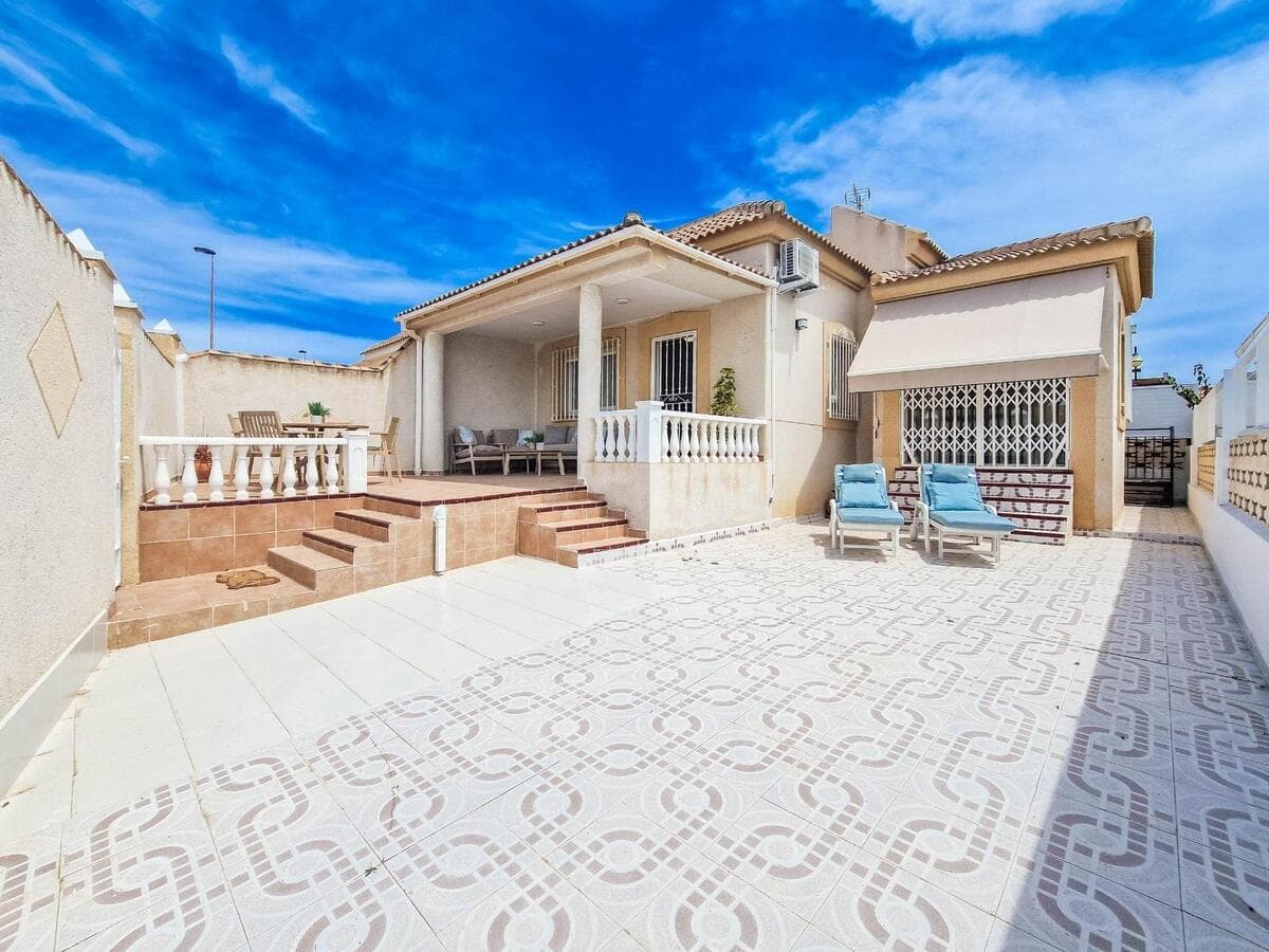 Renovated bungalow for sale in Los Frutales 300m from the sea in Torrevieja.This elegantly renovated bungalow features a bright living room with a dining area, a separate fitted kitchen with a hatch, a bathroom with a walk-in shower, and two bedrooms. In the front of the house lies a covered terrace and an open terrace with seating and sunbathing areas, as well as parking for one car. Roof terrace. Sold fully furnished. A/C.This urbanization lies close to all necessary amenities such as supermarkets, pharmacy, shops, bars and restaurants. The sea is 600m away. The beach of Playa de Los Locos is 1 km away.