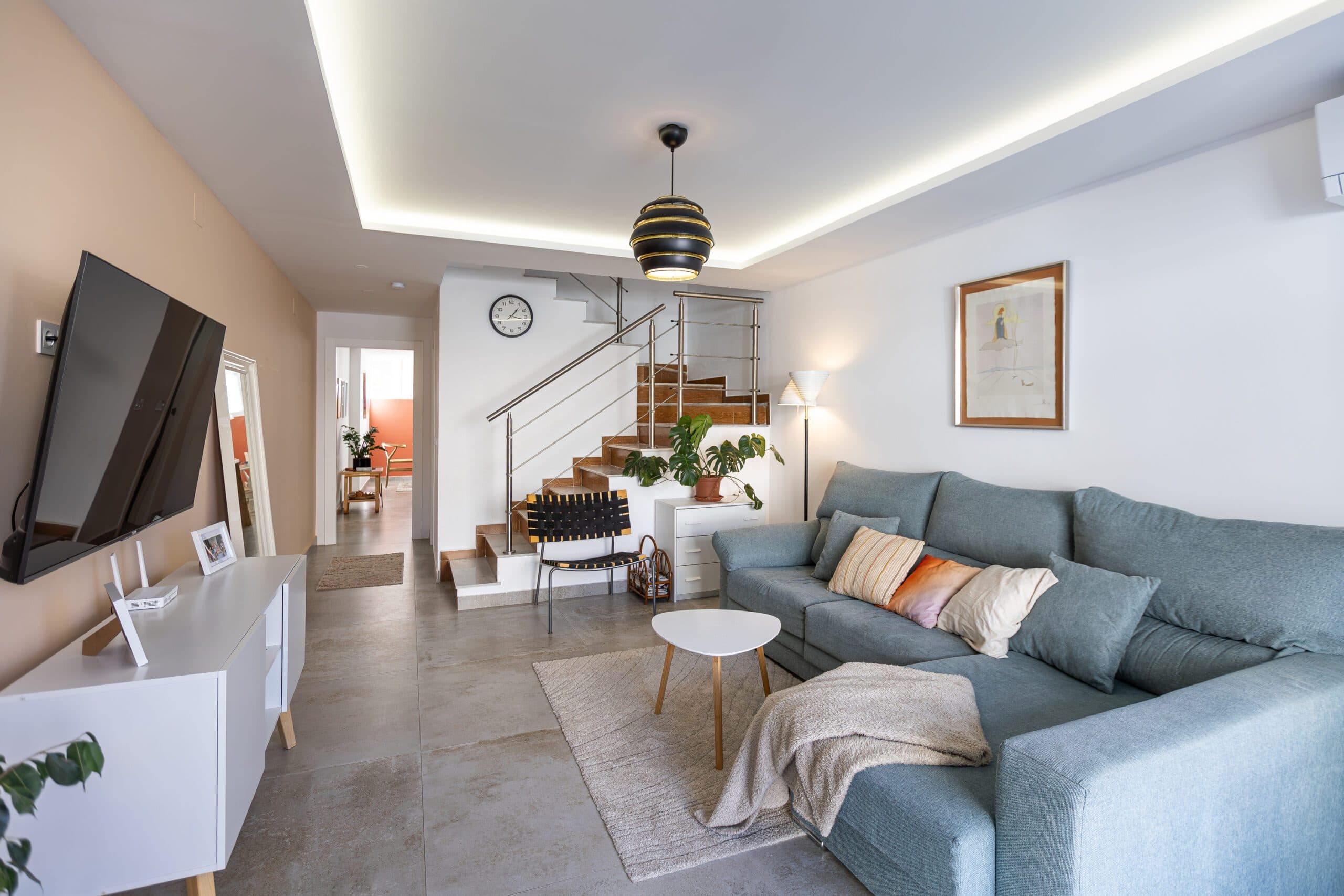 Fully Renovated Townhouse for sale in Nueva Torrevieja.Discover this stunning fully renovated 3-storey townhouse located in the quiet and sought-after area of Nueva Torrevieja, offering modern design, high-quality finishes and ready-to-move-in comfort.The property features 3 spacious bedrooms and 2 full bathrooms, a separate fully equipped kitchen with dining area, and a bright, airy living room with impressive triple sliding glass doors opening directly onto the front garden. Its west-facing orientation guarantees beautiful afternoon sunshine.The home has been completely upgraded with new electrical and plumbing installations, new flooring, smooth walls, double-glazed windows, security entrance door and video intercom. It also benefits from a stylish stainless steel staircase railings, spotlights throughout the house, air conditioning in all rooms and built-in wardrobes in all bedrooms.Property layout:Ground floor: Bright living room with beautiful LED ambient lighting, a fully equipped independent kitchen and a complete bathroom.First floor: Two bedrooms and a full bathroom: The main bedroom features triple sliding doors and a private open balcony, and the second bedroom a private glazed balcony.Second floor: Large master bedroom and acceso to a spacious solarium.Located in a peaceful residential area, close to all amenities: supermarkets, bars, schools, public transport, Torrevieja town centre and the beaches. A perfect home for permanent living.Do not miss the chance to buy this fully renovated townhouse in Nueva Torrevieja.