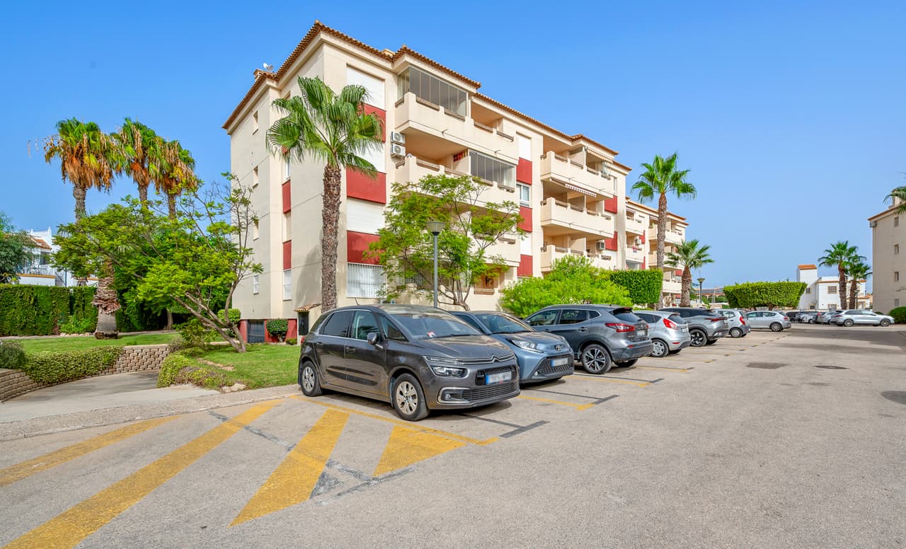 This spacious first floor apartment is located within the sought after gated community of Jumilla III in Playa Flamenca, Orihuela Costa, Alicante. The apartment will be sold fully furnished and consists of a spacious living/dining room, a fully equipped kitchen, two double bedrooms with fitted wardrobes, two bathrooms (one is en-suite), air conditioning (hot/cold), and a generous balcony.There is also a storage room in the underground garage included in the price!Ideally positioned close to the popular La Florida area and nestled between Punta Prima and La Zenia, the property benefits from excellent access to beaches, shops, and everyday amenities.Jumilla III is a well kept development, featuring a large communal garden with swimming pool. The beaches of Playa Flamenca and Punta Prima are just five minutes away by car, La Zenia Boulevard is also a short drive away and offers free parking.Orihuela Costa enjoys year-round popularity thanks to its vibrant atmosphere, wide range of leisure facilities, and proximity to renowned golf courses including Campoamor, Las Ramblas, and Villamartín.