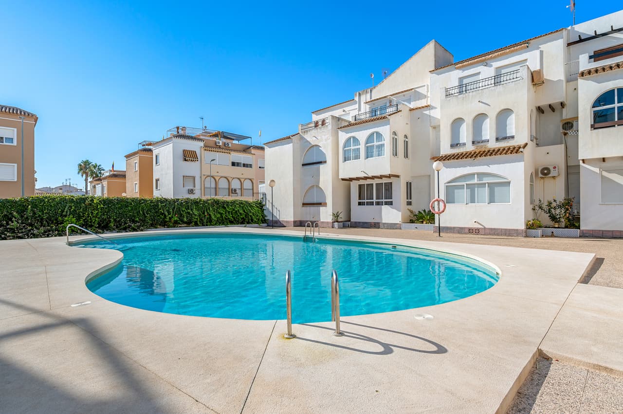 Renovated first floor apartment in "Residencial El Paraiso" situated in Torrevieja, Alicante only a few meters from Playa de los Náufragos, and within walking distance to several supermarkets, cafes and restaurants, pharmacy and best of all...at 300 metres from the beach.This fantastic renovated apartment has a cosy lounge/dining room with an integrated kitchen, air conditioning, two double bedrooms and one bathroom with bathtub. The gated urbanization has several green areas with swimming pool.It is a unique opportunity, since the property is advertised at market price but without having to update it in any way, ready to move into.