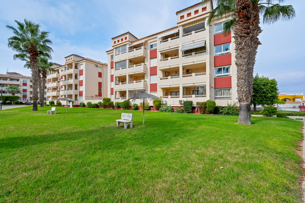 This fantastic second floor south facing apartment is located within the sought after gated community of Jumilla III in Playa Flamenca, Orihuela Costa, Alicante. The apartment will be sold fully furnished and consists of a spacious living/dining room, a fully equipped kitchen, two double bedrooms with fitted wardrobes, two bathrooms (one is en-suite), air conditioning (hot/cold), and a generous balcony.There is also an allocated parking space in the underground garage included in the price!Ideally positioned close to the popular La Florida area and nestled between Punta Prima and La Zenia, the property benefits from excellent access to beaches, shops, and everyday amenities.Jumilla III is a well kept development, featuring a large communal garden with swimming pool. The beaches of Playa Flamenca and Punta Prima are just five minutes away by car, La Zenia Boulevard is also a short drive away and offers free parking.Orihuela Costa enjoys year-round popularity thanks to its vibrant atmosphere, wide range of leisure facilities, and proximity to renowned golf courses including Campoamor, Las Ramblas, and Villamartín.
