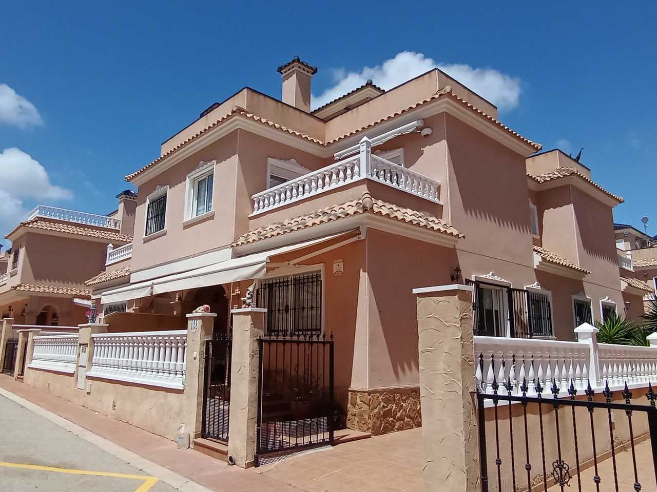 Beautiful 3 bedroom quad-style townhouse in Los Dolses, Alicante located in the exclusive Residencial Vista Azul, one of the most desirable developments on the Orihuela Costa. This home perfectly combines Mediterranean style, comfort and an excellent location within a quiet, family-friendly environment close to all essential amenities. The ground floor offers a bright living/dining room with direct access to the terrace, a fully equipped independent kitchen, one bedroom ideal for guests or a home office, and a complete bathroom. The upper floor features two bedrooms with fitted wardrobes, a second bathroom, and access to a 20 m² private rooftop terrace/solarium, perfect for sunbathing, relaxing or enjoying open views.The property is in excellent condition and equipped with air conditioning, awnings, security door and private parking inside the plot. The spacious terrace surrounding the house provides several outdoor dining and chill-out areas, ideal to enjoy the Mediterranean climate all year round.The complex offers exceptional communal facilities including two swimming pools (one covered heated), jacuzzi, sauna and gym, making it one of the most complete and sought after communities in the area. Located next to Villamartin golf course, close to La Zenia Boulevard shopping centre and Playa Flamenca, and only 3 km from the beaches of Orihuela Costa, this home is perfect for those looking to buy a duplex or invest in a property for sale on the Costa Blanca.A charming property, ready to move into, ideal as a permanent home, a holiday residence or a real estate investment in Orihuela Costa.