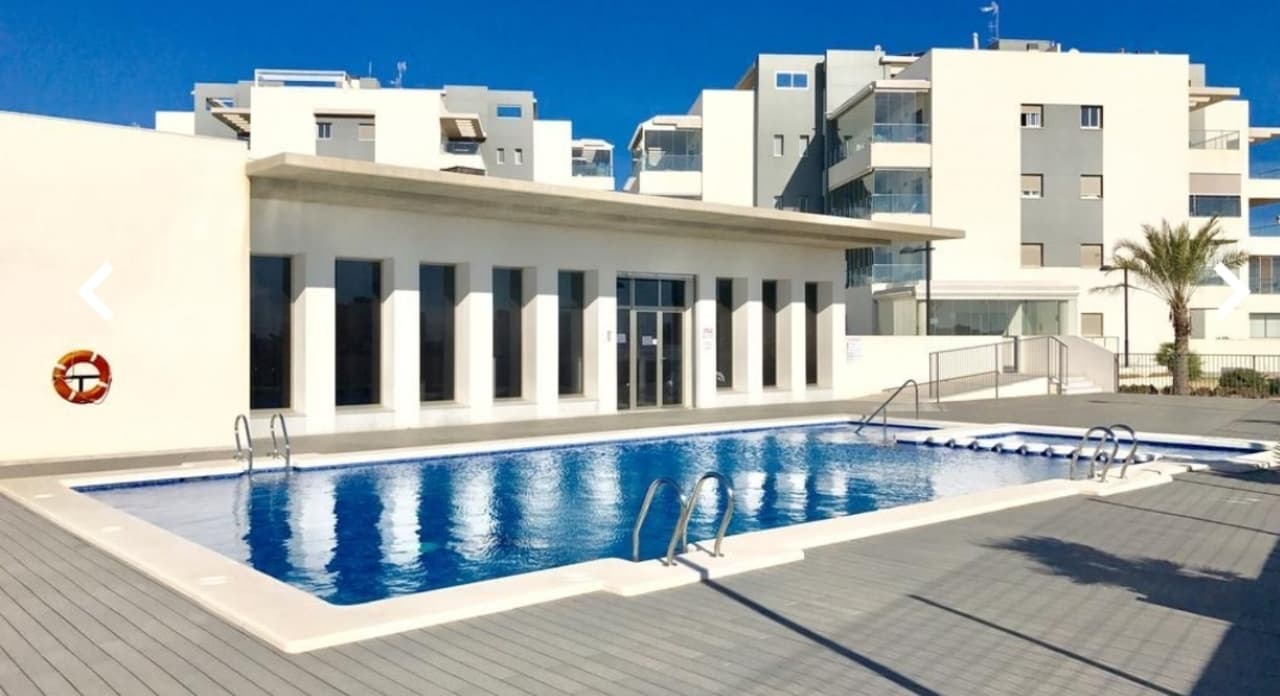 Luxurious 2 bedroom, 2 bathroom apartment on the second floor, built with the highest quality materials and designed to a very high standard. The complex offers a communal swimming pool, spa with jacuzzi, gym, Finnish and Turkish sauna.This modern apartment consists of a spacious lounge/dining area, an open plan fully equipped kitchen, one master bedroom with en-suite bathroom, another double bedroom and a guest's bathroom, air conditioning (hot/cold) throughout the property, patio doors lead out to a large covered south facing terrace with stunning sea views and to enjoy the all day sun. Allocated parking space included in the price!This is a beautiful high quality apartment, set in a great location close to all amenities and is just a short drive to golf and the sea.The Los Dolses area is very popular with tourists and most of the population consists of Western European expatriates and is only a short walk to the La Zenia Boulevard and the Playa Flamenca market. There are also several golf courses nearby and numerous beaches.