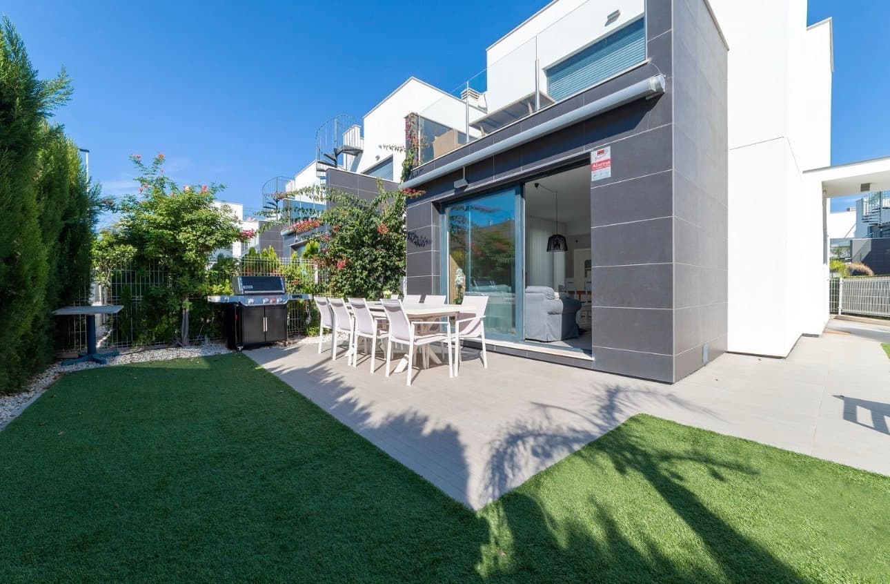 Punta Prima | <br />This is not just another property — this is a clean, move-in-ready villa where everything actually makes sense.Location? Strong.<br />Around 600 meters to the sea — реально пешком, не “5 minutes by car”. Restaurants, bars, shops — all within walking distance. Life is happening here.The house itself — modern, fresh, no nonsense:<br />open-plan layout, lots of natural light, big windows. Feels spacious, not cramped.<br />The kitchen is fully equipped and functional — made for real living, not just for photos.From the living room you walk straight out to your private garden — and that’s where the lifestyle kicks in:<br />dining area, BBQ, chill zone, space for guests. Whether it’s quiet evenings or hosting friends — it works.3 bedrooms.<br />The master bedroom upstairs comes with its own private terrace — morning coffee, evening wine, солнце, всё как надо.2 modern bathrooms — clean design, good quality finishes.⸻Extras that matter:• Communal pool (proper one, not a joke)<br />• Garage<br />• Quiet, safe residential area⸻Key features:• 99 m² built<br />• 3 bedrooms<br />• 2 bathrooms<br />• 30 m² terrace<br />• Private garden<br />• Communal pool<br />• Garage<br />• 600 m to the sea⸻Bottom line:<br />This is a solid, well-balanced property. No hidden headaches, no compromises.<br />Perfect as a permanent home or a high-quality holiday base.If your client wants comfort, location and a clean product — this one hits