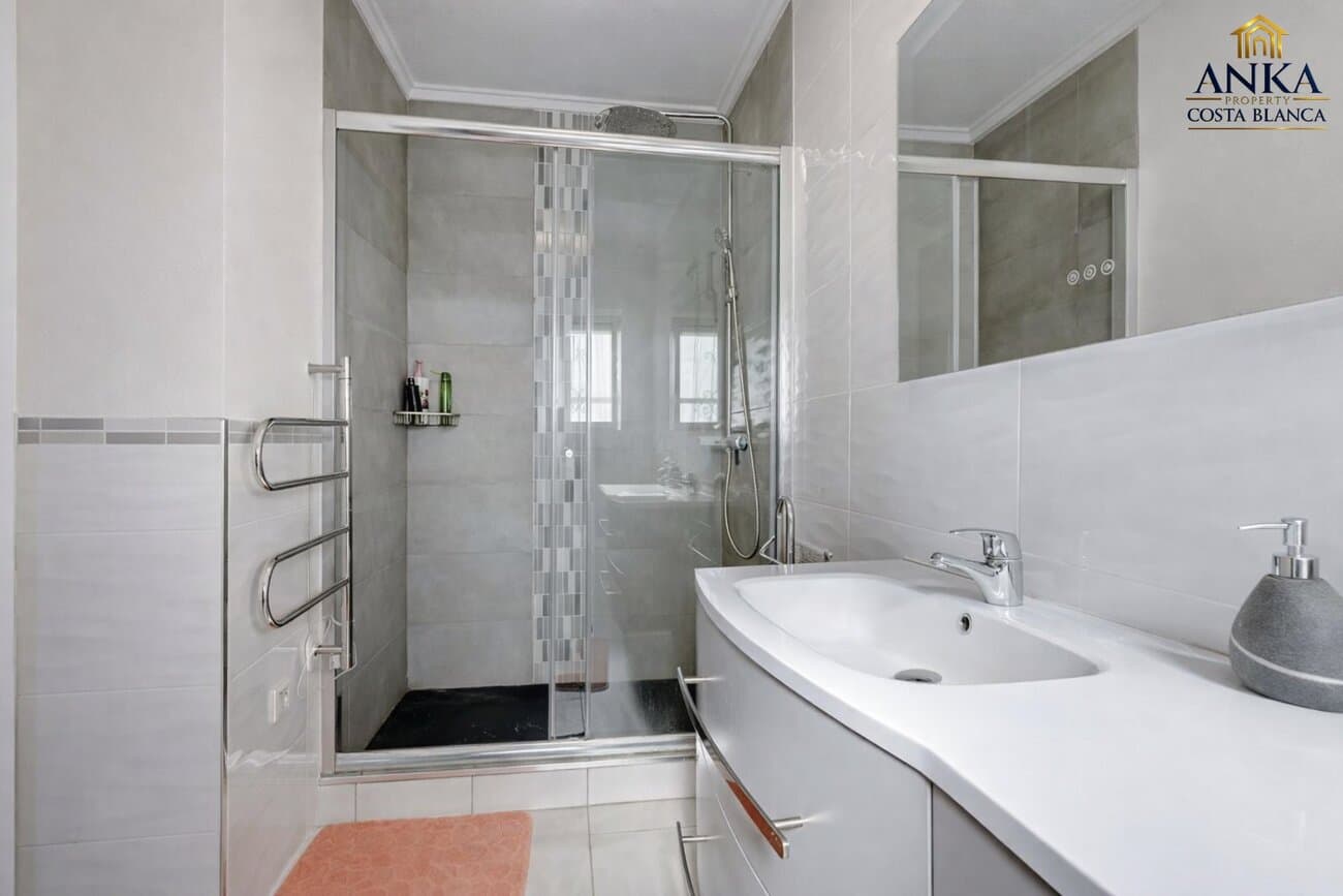 This beautifully reformed south facing detached villa enjoys a prime frontline position overlooking La Marquesa Golf Course in Ciudad Quesada. Ideally located on the lower part of the golf resort, the property is within walking distance of shops, restaurants and everyday amenities, offering an excellent balance of privacy, views and convenience.Set on a generous plot of approximately 710 m², the villa benefits from open golf views and outstanding outdoor living areas. The exterior includes a private swimming pool, ornamental fish pond, several seating and dining terraces, a carport, storage rooms and a dedicated utility area, all designed to make the most of the Mediterranean climate.The main living level offers a bright and welcoming living room, an enclosed glass terrace with panoramic golf views, a modern separate kitchen with dining area, three spacious bedrooms and two bathrooms. The master bedroom features a walk in dressing room and an en suite bathroom, providing comfort and privacy.The upper level adds significant versatility, with a large room currently used as a snooker room, a WC, and access to a private terrace and solarium. This space is ideal for entertaining and could easily be converted into a fourth bedroom, guest suite or additional living area.Finished to a high standard and equipped with solar panels, the property is offered fully furnished subject to offer.An excellent opportunity to acquire a quality villa with private pool and golf course views in one of the most sought after areas of Ciudad Quesada, ideal as a permanent residence or a holiday home.