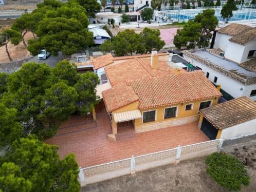 South-Facing 3 Bed-2 bath Semidetached Villa Just 400 Metres from the Beach — Prime Location & Excellent Investment OpportunityLocated in one of the most sought-after residential areas of Orihuela Costa, Punta Prima, this spacious south-facing semidetached villa offers the perfect combination of lifestyle, location, and investment potential.Situated on the beachside of the N-332 and less than 400 metres from the sea, the property enjoys easy walking access to beaches, restaurants, shops, and all essential amenities — making it ideal as a permanent residence, holiday home, or rental investment in the Costa Blanca South.Set on a generous 274m² plot, the villa offers 131m² of built area distributed entirely on one level, with the additional possibility of constructing a second floor, adding even more value and future potential.Property Highlights- 3 Bedrooms<br />- 2 Bathrooms<br />- 131m² Built Area<br />- 274m² Private Plot<br />- South Facing<br />- Only 400m from the Beach<br />- Private Garage + Additional Parking<br />- Large Sunny Garden with BBQ & Pergola Area<br />- Covered Terraces & Patio Areas<br />- Enough space for a Swimming Pool<br />Potential to Extend with an Additional FloorDesigned for Mediterranean LivingThis charming semidetached villa features a spacious lounge area, a self-contained fully fitted kitchen, and excellent outdoor space designed for enjoying the Mediterranean climate all year round.The large private garden includes:- BBQ and entertaining area- Built pergola for shaded outdoor dining- Sun terraces- Off-street parking- Private garage Storage and utility roomThe property also benefits from:- Air conditioning<br />- Double glazing<br />- Alarm system<br />- Fitted wardrobes<br />- White goods included<br />- Window security locks<br />- FurnishedExceptional LocationThe villa is ideally positioned within walking distance of:- The beach and promenade- Bars and restaurants- Shops and supermarkets- Public transport- Coastal walking areasThe nearby beach also benefits from lift access, making it particularly convenient for families and residents of all ages.Golf lovers will appreciate the proximity to several renowned golf courses, located just a short drive away.Distances- Beach: 400 metres- Amenities: 50 metres- Golf Courses: 6 km- Alicante Airport: 48 kmAn Excellent Investment OpportunityProperties in this part of Orihuela Costa are increasingly difficult to find, especially semidetached villas within walking distance to the beach and with future extension potential.Whether you are searching for:- a permanent home in Spain,- a holiday property,- or a high-demand rental investment,This semidetached villa represents a fantastic opportunity in one of the Costa Blanca’s most desirable coastal areas.