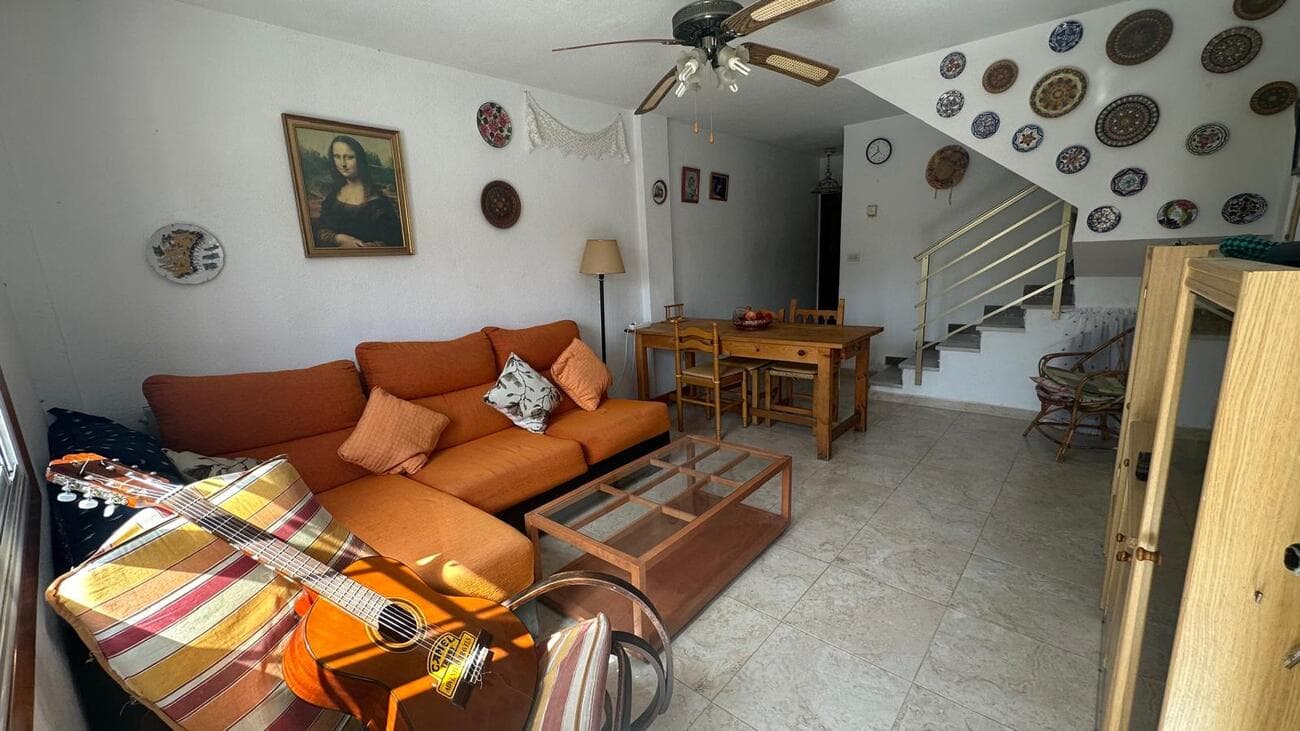  This two-story duplex offers a rare opportunity to create your dream coastal home in one of Santiago de la Ribera’s most sought-after locations. Just 450 metres from the beach and a short walk to the popular Dos Mares shopping centre, you’ll have the sea, shops, cafés, and restaurants right at your doorstep.Currently in need of renovation, this property is a perfect fixer-upper for those looking to add value and personal style. With 70.99 m² built on a 100 m² plot, it features:Ground floor : living room, sitting area, and kitchen.Upper floor : two bedrooms, one bathroom, and a terrace.Outdoor space: 28 m² open patio + 35 m² garden – ideal for relaxing or entertaining.Whether you envision a stylish modern beach house or a charming Mediterranean retreat, this home has the space, location, and potential to become something truly special. Prime location: 450m to the beach, close to Dos Mares, with easy access to services, transport, and leisure options. Investment potential: renovate to your taste and enjoy an enviable coastal lifestyle or strong rental returns.
