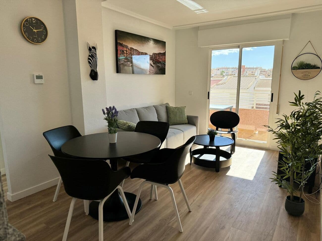 COZY RENOVATED APARTMENT IN LAS CALAS TORREVIEJAFor Sale: Recently Renovated Apartment in Torrevieja, Close to the Center, Boulevard, and BeachLocated in the charming Calas Blancas neighborhood, just 800 meters from Playa de Los Locos and Playa del Cura, this beautifully renovated apartment is part of a traditional Spanish complex.Perfect LocationNearby, you’ll find supermarkets, a park, and a bus stop. The beach is just a 10 to 15-minute walk away. The apartment is situated in a quiet area with all amenities within reach.Layout and FeaturesThis 2nd-floor apartment is tastefully furnished and fully equipped, featuring:2 spacious bedrooms with comfortable beds and built-in wardrobes 1 modern bathroom with luxurious finishes Living room with a smart TV (TV-Vlaanderen and Netflix) New open kitchen, fully equipped with an induction cooktop, oven, microwave, fridge/freezer, Dolce Gusto coffee maker, and more Balcony with seating and a dining table, ideal for enjoying sunsetsThe apartment complex includes additional amenities such as an elevator, ample parking, a shared pool with a spacious sun terrace, and green areas.Extras Everything included! Central air conditioning (hot/cold) High-speed internet (Wi-Fi) Bed linen, towels, a hairdryer, iron, and ironing board provided, TV etc  Rental license available Torrevieja: A Vibrant LocationTorrevieja boasts a lively center with a charming boulevard, numerous shops, restaurants, and markets. Enjoy 20 kilometers of sandy beaches, stunning natural reserves such as La Mata and Guardamar del Segura, and activities like cycling, golfing (9 golf clubs), and water sports. Popular attractions include La Zenia Boulevard, the Aquapolis water park, and nearby cities like Alicante, Cartagena, and Murcia, making this the perfect base for exploration.Contact UsInterested? Contact one of our professional sales agents today for more information, a viewing, or a video call.