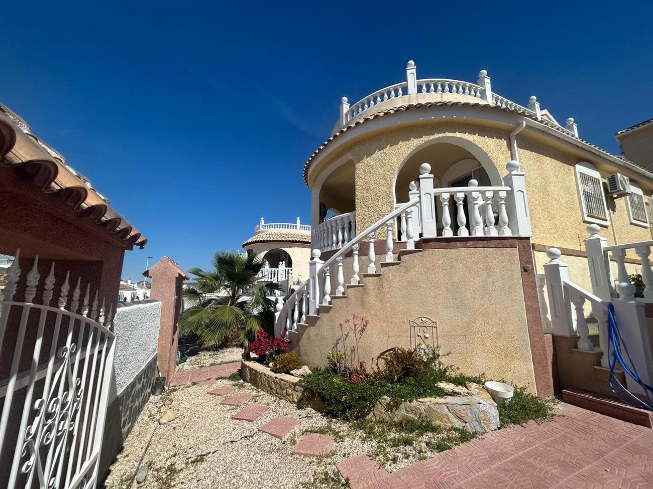 Charming Neptune Villa with Private Pool & Mountain Views – Camposol Sector D<br />€249,000<br /><br />Located in an established area of Camposol Sector D (Calle Salvias), this beautifully presented detached Neptune-style villa offers the perfect blend of comfort, privacy, and Mediterranean lifestyle. Set on a generous 280 m² plot with a build size of 117 m², the property is south-west facing, ensuring sunshine throughout the day and spectacular sunsets over the surrounding mountains.<br /><br />As you enter the property, you are welcomed by a spacious 14 m² covered naya (porch), ideal for relaxing or dining outdoors. Inside, the villa features a bright and airy living room with a cosy fireplace, seamlessly connected to a fully fitted open-plan kitchen equipped with modern appliances, including a dishwasher.<br /><br />The ground floor offers two well-sized bedrooms, including a master with en-suite bathroom, as well as an additional separate bathroom—perfect for family living or guests.<br /><br />On the first floor, accessed via an external staircase (a characteristic feature of Neptune villas), you will find a private guest suite complete with its own en-suite bathroom. This space opens onto an impressive 50 m² terrace with artificial grass, providing a fantastic area for sunbathing, entertaining, or simply enjoying the uninterrupted mountain views.<br /><br />The outdoor area is designed for relaxation and enjoyment, featuring a private swimming pool enhanced with a jet stream and jacuzzi function—your own personal retreat. There is also the option for private parking within the plot.<br /><br />An additional underbuild offers versatile space with a toilet/bathroom area, ideal for storage, a hobby room, or potential further development (please note this area is not registered as a bedroom).<br /><br />The property is sold fully furnished with high-quality, stylish furniture, and benefits from air conditioning throughout, making it ready to move into immediately.<br /><br />Key Features:<br /><br />Detached Neptune villa<br />Private pool with jet stream & jacuzzi<br />3 bedrooms, 3 bathrooms<br />Separate guest suite with large terrace<br />Mountain views<br />Air conditioning & fireplace<br />Fully furnished to a high standard<br />Private parking option<br />No community fees<br /><br />Ideally located just:<br /><br />10 minutes from shops, bars, restaurants, and amenities<br />15 minutes from the beautiful beaches of Bolnuevo, Mazarrón<br /><br />This is a fantastic opportunity to own a stylish and well-appointed villa in a peaceful yet well-connected location—perfect as a permanent home, holiday retreat, or investment property.
