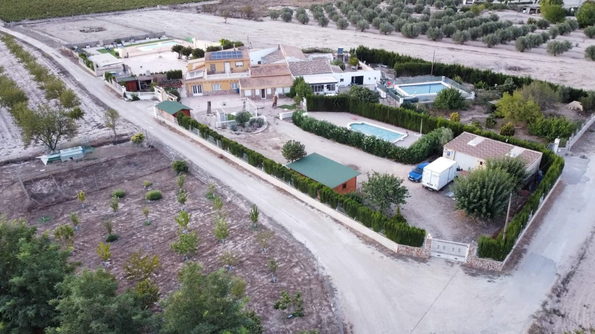 Explore the convenience of this Villa in Villena, within walking distance to a local bar and just 5 km from Villena itself. This expansive property boasts 10 bedrooms, 5 bathrooms, 2 dining rooms, 2 living rooms, and 2 kitchens, providing ample space for comfortable living. There are actually 3 seperate properties which can be used depending on your needs.  Enjoy outdoor living with a covered terrace, 2 swimming pools—one with heating and saltwater and another with chlorine. The villa features air conditioning, 2 barbecues, fireplaces, and a substantial plot of 7200m² with 750m² of living space. The property includes 3 wooden huts, fruit trees, 3 entrances, and an interior patio measuring 70m².This villa offers a perfect blend of spacious interiors, outdoor amenities, and a prime location, making it an ideal retreat for a variety of lifestyles.We have a large portfolio of properties in the Costa Blanca and Costa Calida areas, specialising in country properties, villas, fincas, building plots and design and build options in the Alicante and Murcia regions with a particular emphasis on Elda, Monovar, Pinoso, Sax, Villena, Aspe, Fortuna, Albacete and many more surrounding areas. We have been established since 2004 and have decades of experience between the team which we bring to bear to help you find and secure your new dream home. We help you every step of the way to make sure your purchase in Spain is safe and hassle free. We are not here to sell you a property, we are here to help you realise your dream and find what is right for you. With us you are in the safest hands. Contact us now to have a no obligation chat about how you too can realise your dreams.
