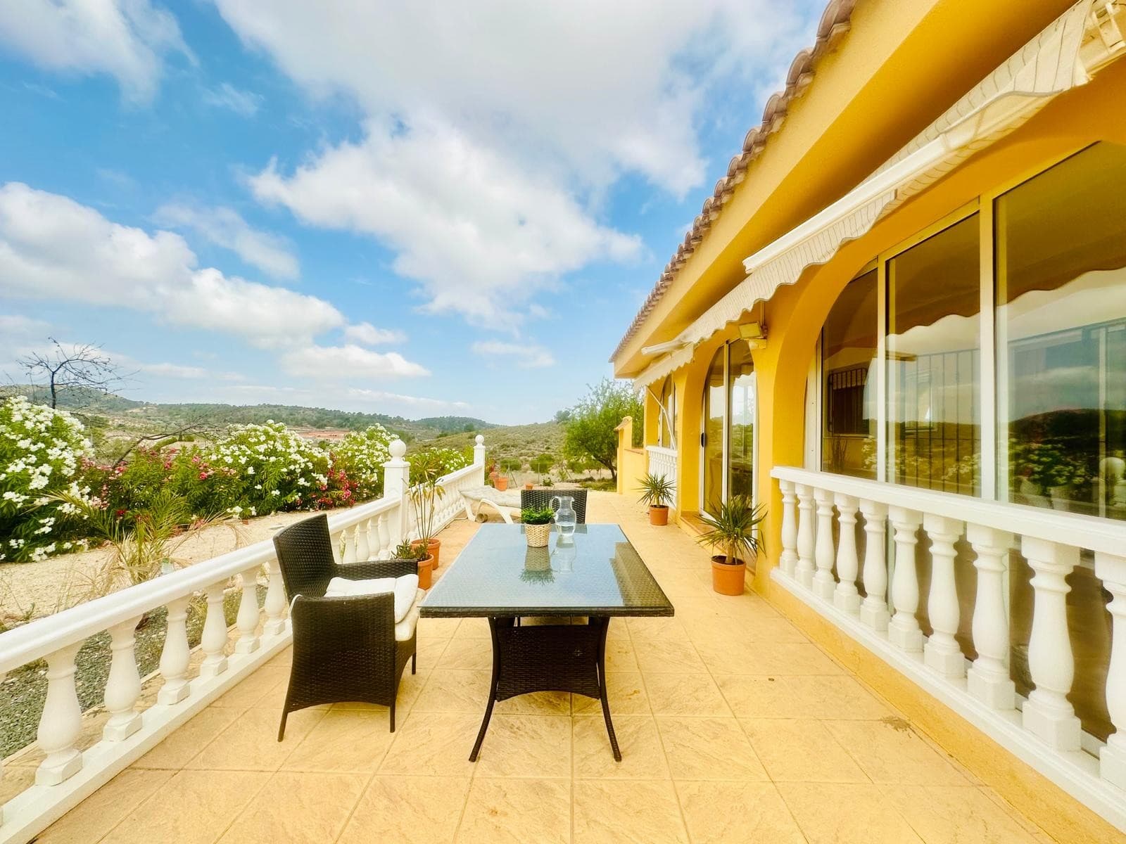 This villa in the mountain area of La Zara offers a perfect blend of comfort, luxury and natural beauty. The house spans 178m² on a fully fenced plot of 2,700m², featuring a private pool and stunning views. Inside, you'll find three bedrooms with built-in wardrobes, including a master bedroom with an ensuite bathroom, and an additional bathroom for convenience.The villa boasts a fully glazed winter garden, ideal for enjoying the scenery year-round. Four air conditioning units ensure comfort in every season, while a fireplace adds a cozy touch. Additional features include a 20,000-litre water deposit and security grills for peace of mind. This property combines modern amenities with a serene mountain setting, making it a perfect retreat.We have a large portfolio of properties in the Costa Blanca and Costa Calida areas, specialising in country properties, villas, fincas, building plots and design and build options in the Alicante and Murcia regions with a particular emphasis on Elda, Monovar, Pinoso, Sax, Villena, Aspe, Fortuna, Albacete and many more surrounding areas. We have been established since 2004 and have decades of experience between the team which we bring to bear to help you find and secure your new dream home. We help you every step of the way to make sure your purchase in Spain is safe and hassle free. We are not here to sell you a property, we are here to help you realise your dream and find what is right for you. With us you are in the safest hands. Contact us now to have a no obligation chat about how you too can realise your dreams.