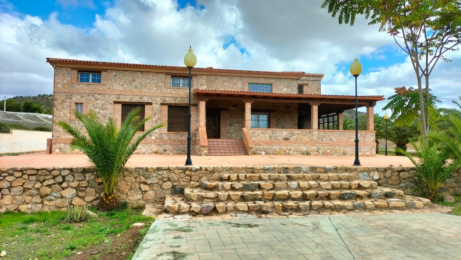 Explore the possibilities of this remarkable villa, boasting approximately 500 square meters of living space set on a sprawling 14,000 square meter plot. With a total of 8 bedrooms, 3 bathrooms, and a variety of spacious rooms, this property offers versatility and comfort.This villa is equipped with every modern convenience, ensuring a lifestyle of luxury and ease. Enjoy leisurely days by the pool or host gatherings in the covered barbecue area. Additional amenities include a workshop, garage, pool house with facilities, mature and ornamental trees providing shade, a basement, water purification and softening system, central heating, and a master bedroom complete with a walk-in wardrobe, among other features.Whether you appreciate the tranquility of the lush surroundings, the convenience of ample storage space, or the thoughtful design elements throughout, this property has much to offer. Schedule a viewing today to experience firsthand the extensive comforts and potential this villa brings to gracious living.PLEASE NOTE: the property does need some attention as it gardens have been left to over grow.  We have a large portfolio of properties in the Costa Blanca and Costa Calida areas, specialising in country properties, villas, fincas, building plots and design and build options in the Alicante and Murcia regions with a particular emphasis on Elda, Monovar, Pinoso, Sax, Villena, Aspe, Fortuna, Albacete and many more surrounding areas. We have been established since 2004 and have decades of experience between the team which we bring to bear to help you find and secure your new dream home. We help you every step of the way to make sure your purchase in Spain is safe and hassle free. We are not here to sell you a property, we are here to help you realise your dream and find what is right for you. With us you are in the safest hands. Contact us now to have a no obligation chat about how you too can realise your dreams.