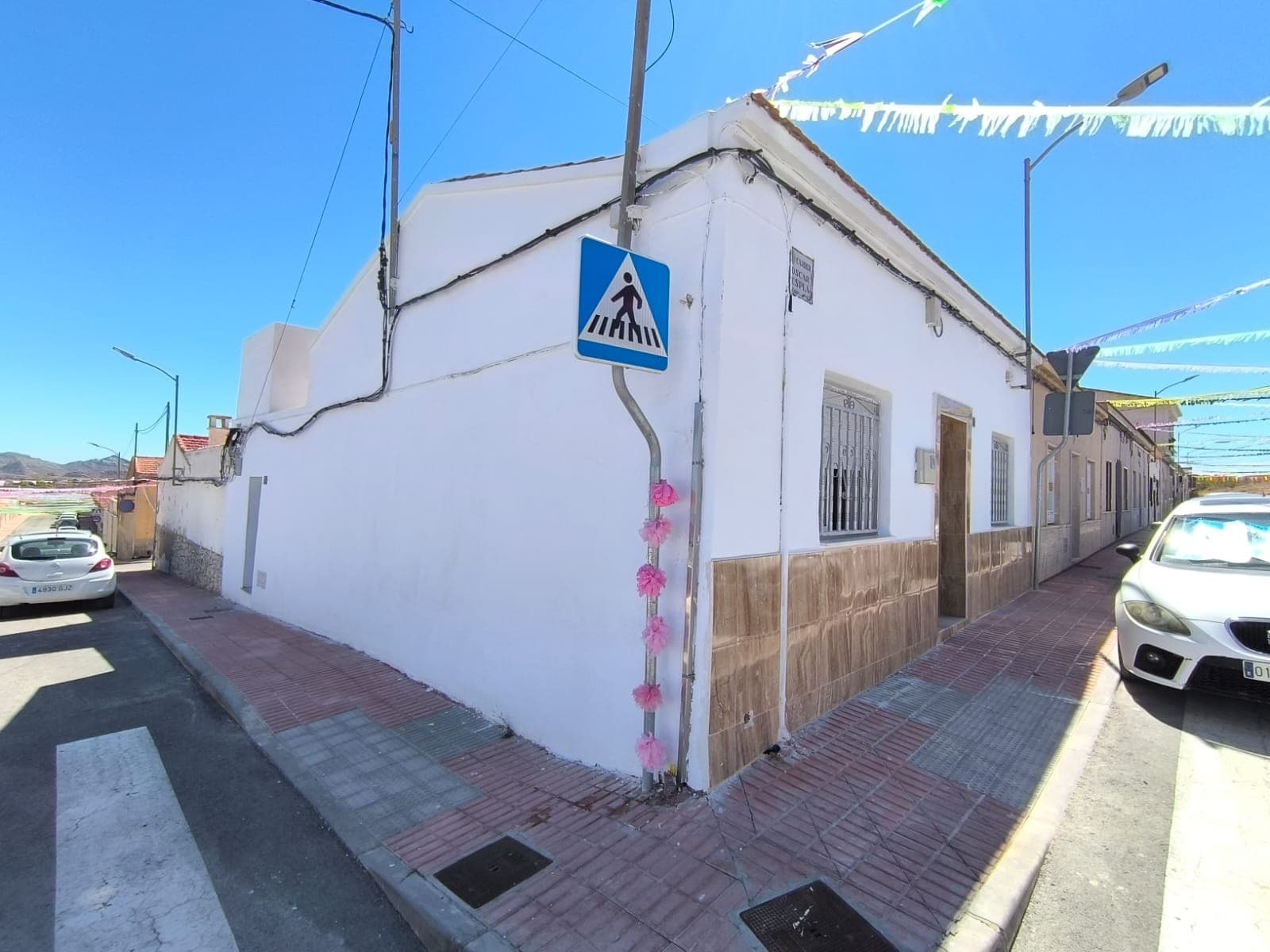 Newly reformed townhouse on the corner of the street on the edge of Monovar. On 115 m2 built there are 3 bedrooms, 2 luxurious bathrooms, a large salon with an open kitchen, and a little patio with a laundry room. Climb up to a roof terrace with splendid views over the surrounding countryside and mountains. Located in calm part of the town, yet in walking distance from daily amenities.The house, spacious and bright, has been finished with quality materials up to modern standards, all wiring and plumbing are new, and so are the windows. The roof terrace will be finished with a proper floor. The property is sold with the furniture in the pictures included, all it needs to be finished is a kitchen furniture, appliances, and stairs to the upper terrace. Low price for a quick sale, wonderful opportunity! About the area: Monovar (Alicante, Spain), known for its stunning countryside, and welcoming atmosphere, offers a perfect blend of traditional Spanish culture and modern conveniences. Surrounded by picturesque vineyards and rolling hills, the town is renowned for its quality of life, with excellent local amenities, schools, and easy access to both the vibrant cities of Alicante and Elche, as well as airport and Mediterranean beaches. About us: We have a large portfolio of properties in the Costa Blanca and Costa Calida areas, specialising in country properties, villas, fincas, building plots and design and build options in the Alicante and Murcia regions with a particular emphasis on Elda, Monovar, Pinoso, Sax, Villena, Aspe, Fortuna, Albacete and many more surrounding areas. We have been established since 2004 and have decades of experience between the team which we bring to bear to help you find and secure your new dream home. We help you every step of the way to make sure your purchase in Spain is safe and hassle free. We are not here to sell you a property, we are here to help you realise your dream and find what is right for you. With us you are in the safest hands. Contact us now to have a no obligation chat about how you too can realise your dreams.
