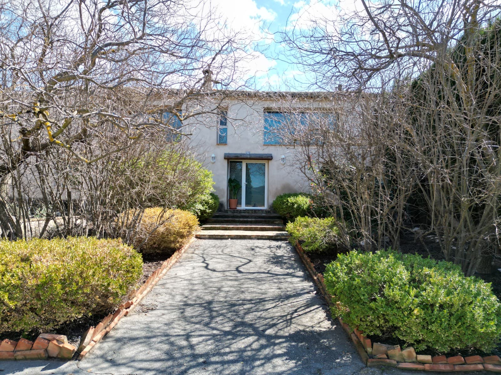 Spacious Country Home with Pool and Large Plot in Campo de Mirra (near Villena)This substantial country house is located in the peaceful area of Campo de Mirra, just outside Villena, offering space, privacy, and a comfortable rural lifestyle. Set on a 20,000 m² plot, 4,000 m² are fenced around the house, the property includes a 588 m² house, landscaped gardens, mature trees, and several outdoor living areas designed for enjoying the surrounding countryside.The house currently offers four bedrooms and two bathrooms, with the possibility to create up to six more bedrooms if required. Currently there is a large studio (approx 250m2) and creative space ideal for budding artists or somebody wanting a separate workshop space. this lovely bright space could also be used to create an independent property for either renting out or for family and friends.Inside, the property features a large entrance hall, generous living areas, and a large master bedroom with dressing room and ensuite bathroom with a walk-in shower. The home combines traditional character with practical modern features such as polished concrete floors, security windows, and a log burner for comfortable living throughout the year. The roof has been repaired, treated, and insulated, adding to the property's overall quality.The layout also includes a large glazed porch, ideal as an additional sitting or dining space with views over the garden. A 300-year-old traditional oven adds a unique historic touch to the property.Outside, the house benefits from several attractive spaces for relaxing and entertaining. There is a 10 × 2.5 metre swimming pool set within a patio area finished with distinctive fossil stone paving, along with a BBQ area and a rear patio. The grounds include landscaped garden areas and land planted in front of the house.Additional practical features include two garage areas (currently without doors), a storage room, and a separate parking area outside the courtyard. The main courtyard can be secured with an electric gate. There is also a separate annex room, which could potentially be connected to the upper level of the house to create a self-contained apartment for guests or extended family.The property is connected to mains water and electricity, includes a water decalcifier, and benefits from tarmac road access, making it easy to reach while still enjoying the tranquillity of the countryside.Please note that the property is attached on either side, although due to the cypress trees and the way it is configured, it is extremely private. About the AreaCampo de Mirra is a small and traditional village located between Villena and the inland valleys of Alicante. The area is known for its wide open landscapes, vineyards, and quiet rural lifestyle. Nearby Villena provides a full range of services including shops, restaurants, schools, and a high-speed train station with connections to Alicante, Madrid, and Valencia. Alicante airport and the Mediterranean coast are also within comfortable driving distance, making this a well-connected yet peaceful place to live.We have a large portfolio of properties in the Costa Blanca and Costa Calida areas, specialising in country properties, villas, fincas, building plots and design and build options in the Alicante and Murcia regions with a particular emphasis on Elda, Monovar, Pinoso, Sax, Villena, Aspe, Fortuna, Albacete and many more surrounding areas. We have been established since 2004 and have decades of experience between the team which we bring to bear to help you find and secure your new dream home. We help you every step of the way to make sure your purchase in Spain is safe and hassle free. We are not here to sell you a property, we are here to help you realise your dream and find what is right for you. With us you are in the safest hands. Contact us now to have a no obligation chat about how you too can realise your dreams.