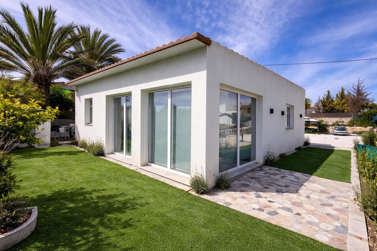 This charming country home offers a comfortable and well-designed living space, ideal for those seeking a peaceful environment without giving up proximity to essential services. The property features a bright and spacious living room with an open-plan kitchen and breakfast bar, creating a practical and welcoming area for both everyday living and entertaining. The layout is functional and open, making the most of the space and enhancing the feeling of comfort throughout the home.The house includes three well-sized bedrooms, all with plenty of natural light, and a fully equipped bathroom. It is presented in excellent condition and is ready to move into immediately. The minimalist interior design provides a clean and modern look, while also allowing new owners to easily personalize each space to their taste.Natural light is a key feature of the property, with large windows that create a warm and inviting atmosphere in every room. The house is sold unfurnished, offering a blank canvas for decoration. For year-round comfort, the property has centralized ducted air distributed through integrated ceiling vents, providing uniform thermal comfort, a clean aesthetic, and maximum efficiency throughout all rooms.The home is fully connected to essential services, including electricity, potable water, irrigation water, and the main sewer system, ensuring convenience and reliability for daily living.Outside, the property enjoys a quiet and private setting, perfect for relaxing and enjoying the surrounding countryside. It is an excellent option as a permanent residence or as a second home for weekend getaways.The location is one of its main advantages. Situated in a very quiet area just one minute from Monóvar, the property offers the perfect balance between countryside living and accessibility. All services such as supermarkets, restaurants, schools, and healthcare are close by, and the town can easily be reached on foot, making everyday life simple and convenient.Overall, this is a bright, well-maintained, and move-in-ready home in an excellent location, ideal for buyers looking for comfort, simplicity, and immediate access to all amenities.If you liked this property, do not hesitate to contact us to organize a visit, we will be happy to help you!We have a large portfolio of properties in the Costa Blanca and Costa Calida areas, specialising in country properties, villas, fincas, building plots and design and build options in the Alicante and Murcia regions with a particular emphasis on Elda, Monovar, Pinoso, Sax, Villena, Aspe, Fortuna, Albacete and many more surrounding areas. We have been established since 2004 and have decades of experience between the team which we bring to bear to help you find and secure your new dream home. We help you every step of the way to make sure your purchase in Spain is safe and hassle free. We are not here to sell you a property, we are here to help you realise your dream and find what is right for you. With us you are in the safest hands. Contact us now to have a no obligation chat about how you too can realise your dreams